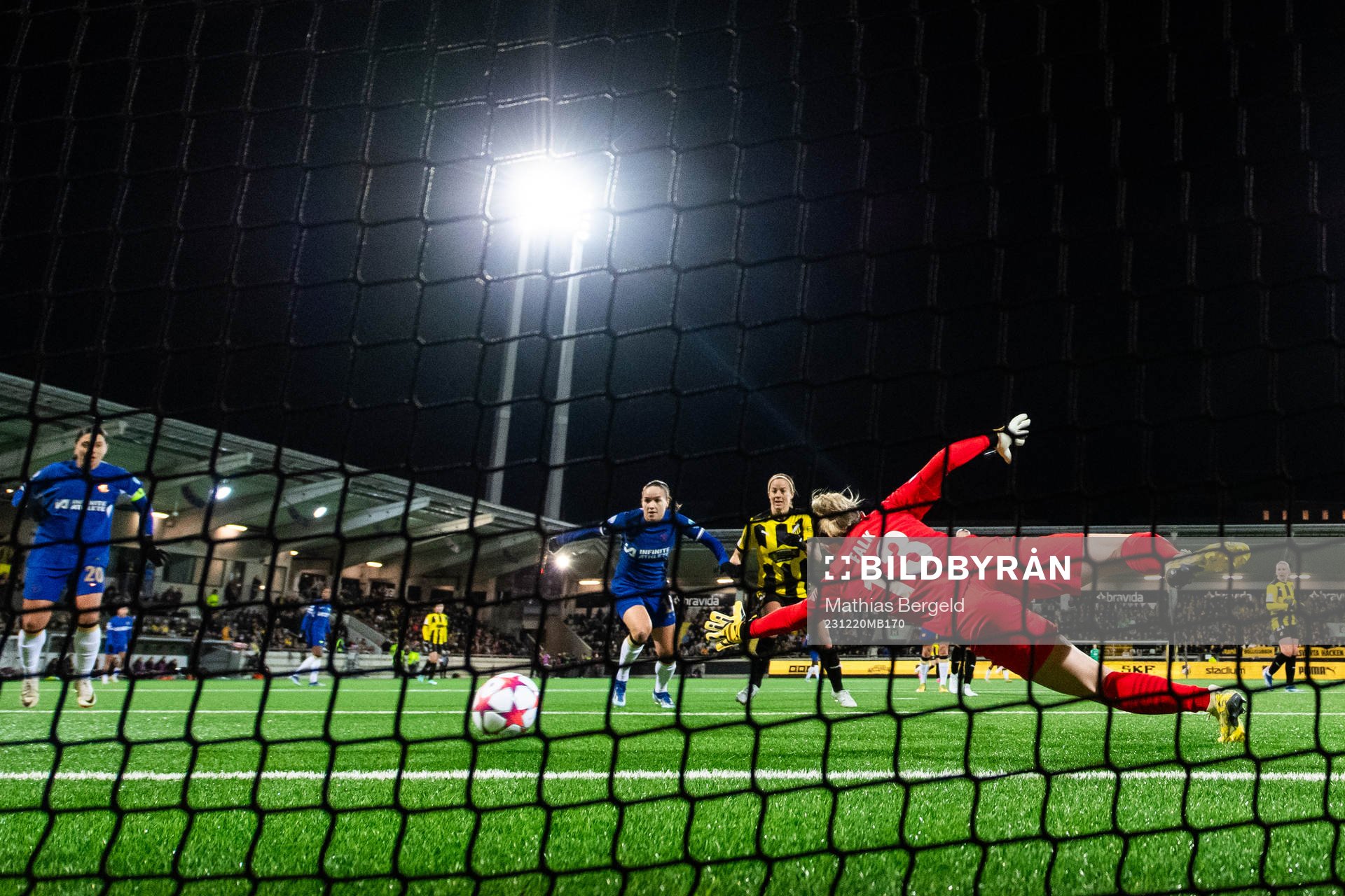 Erin Cuthbert of Chelsea (not pictured) scores 1-2 behind