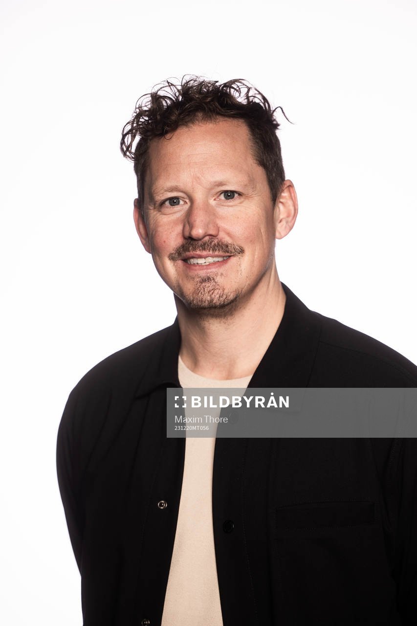Fredrik Warg, studio Oddset poses for a portrait