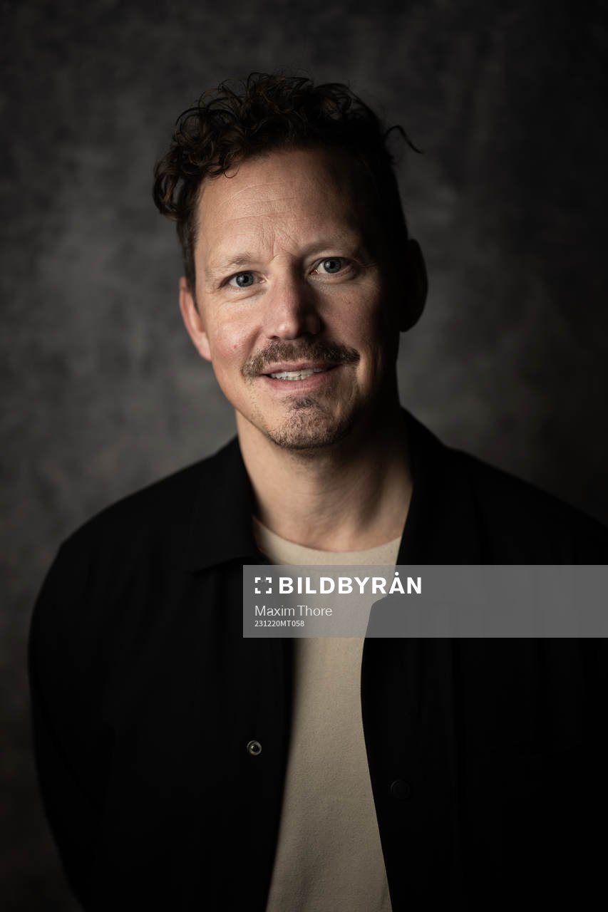 Fredrik Warg, studio Oddset poses for a portrait