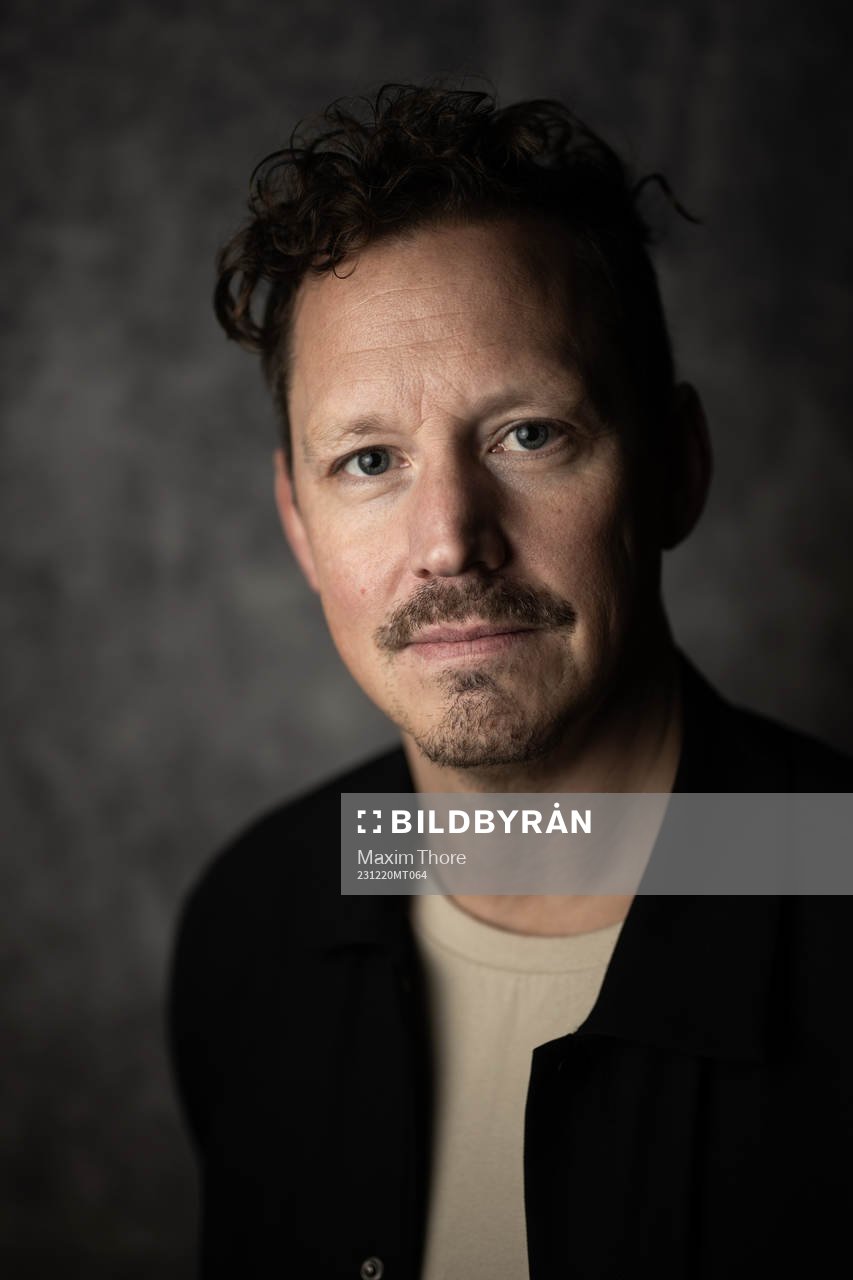 Fredrik Warg, studio Oddset poses for a portrait