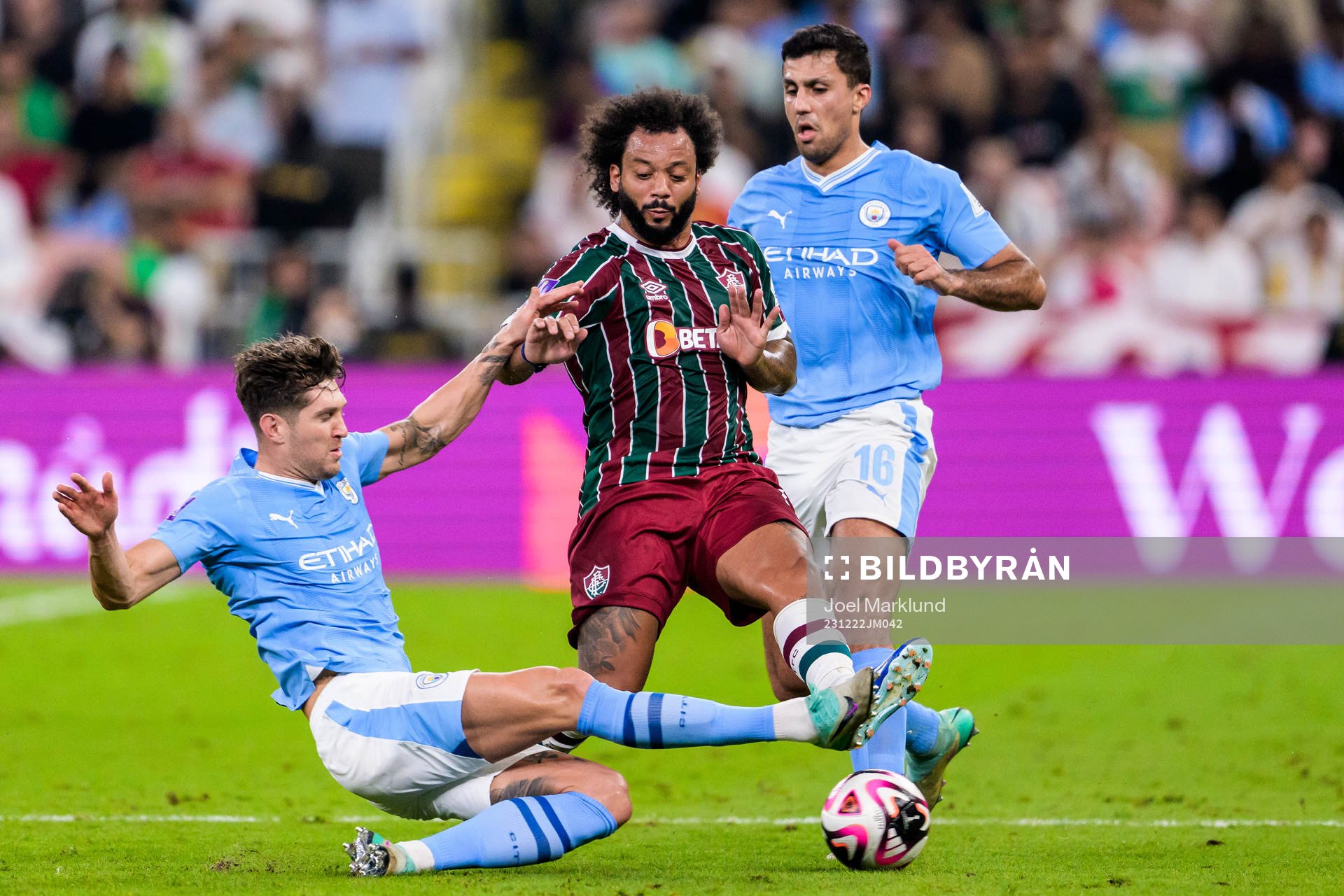 John Stones and Rodrigo of Manchester City and Marcelo of