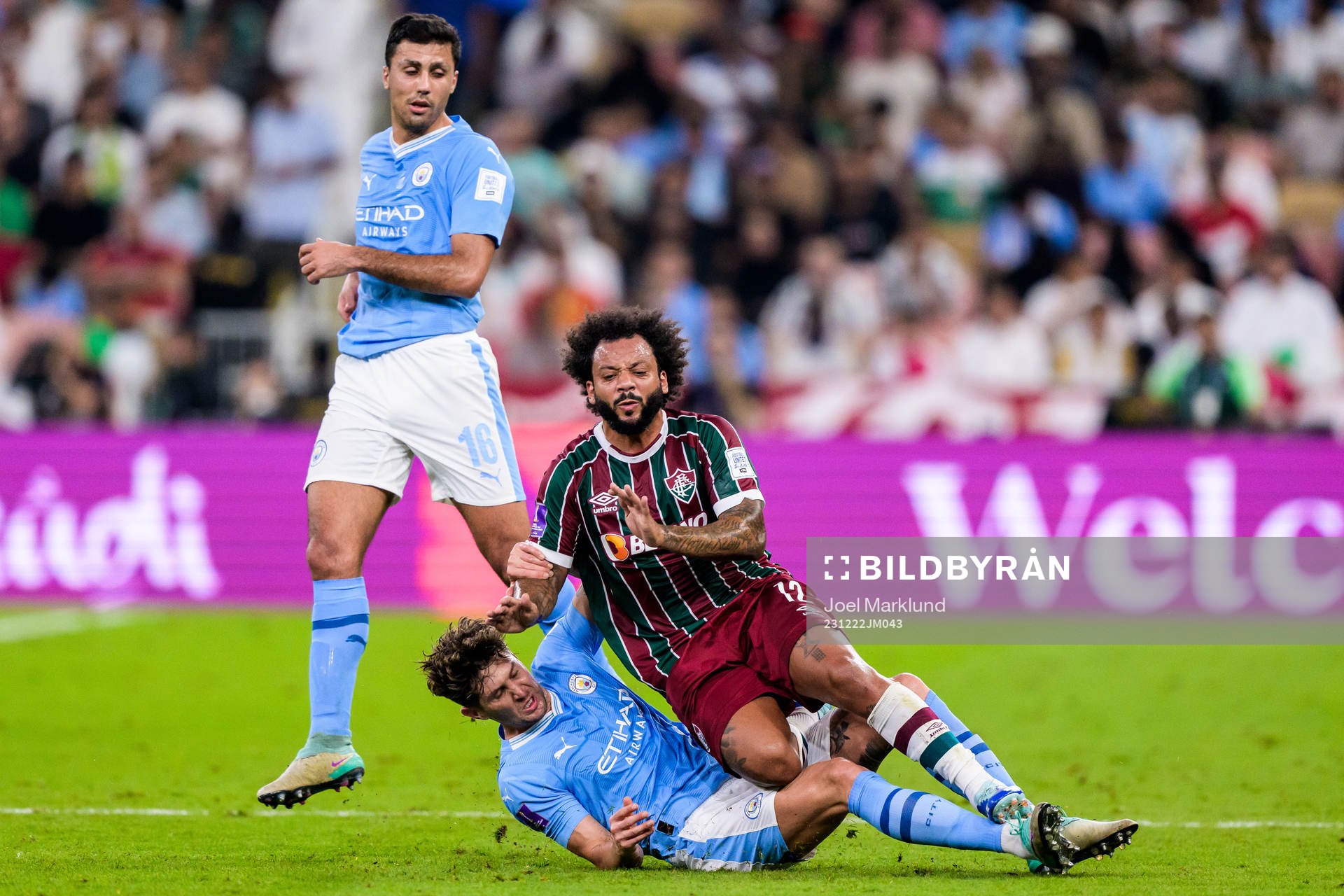 John Stones and Rodrigo of Manchester City and Marcelo of Fluminense during the FIFA Club World Cup final match between Fluminense and Manchester City on December 22, 2023 in Jeddah.