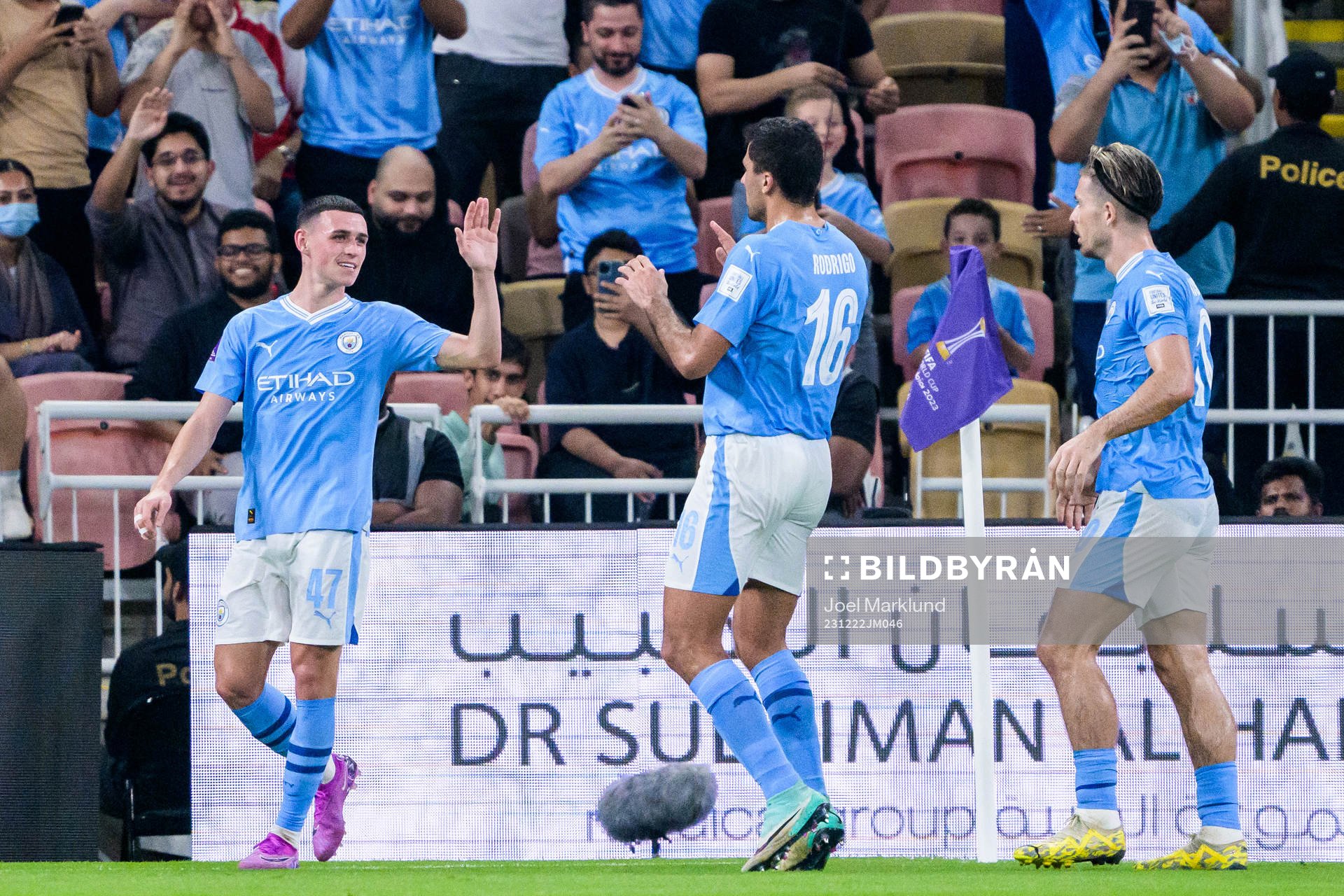 Phil Foden, Rodrigo, and Jack Grealish of Manchester City