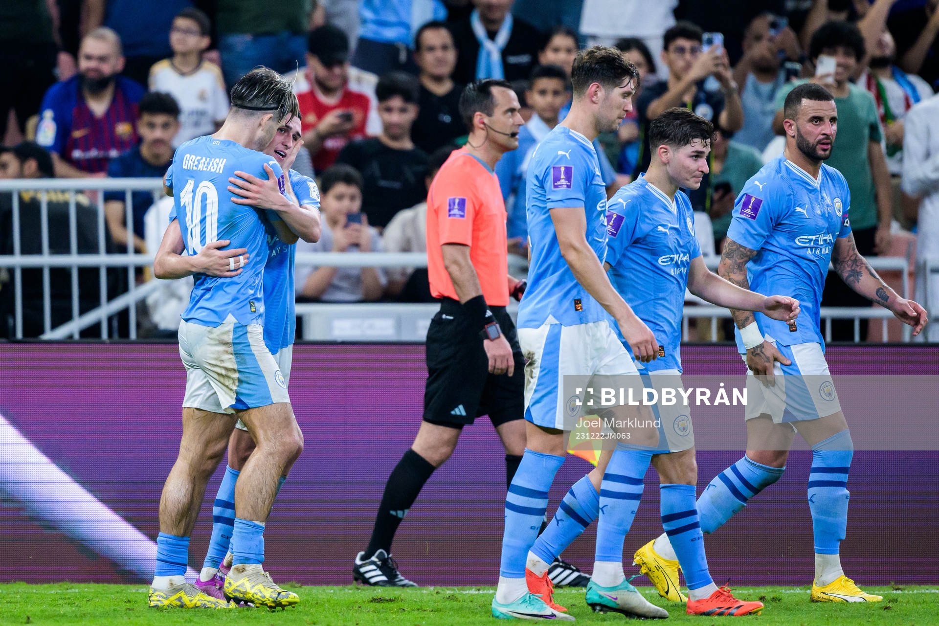 Jack Grealish and Phil Foden of Manchester City celebrate