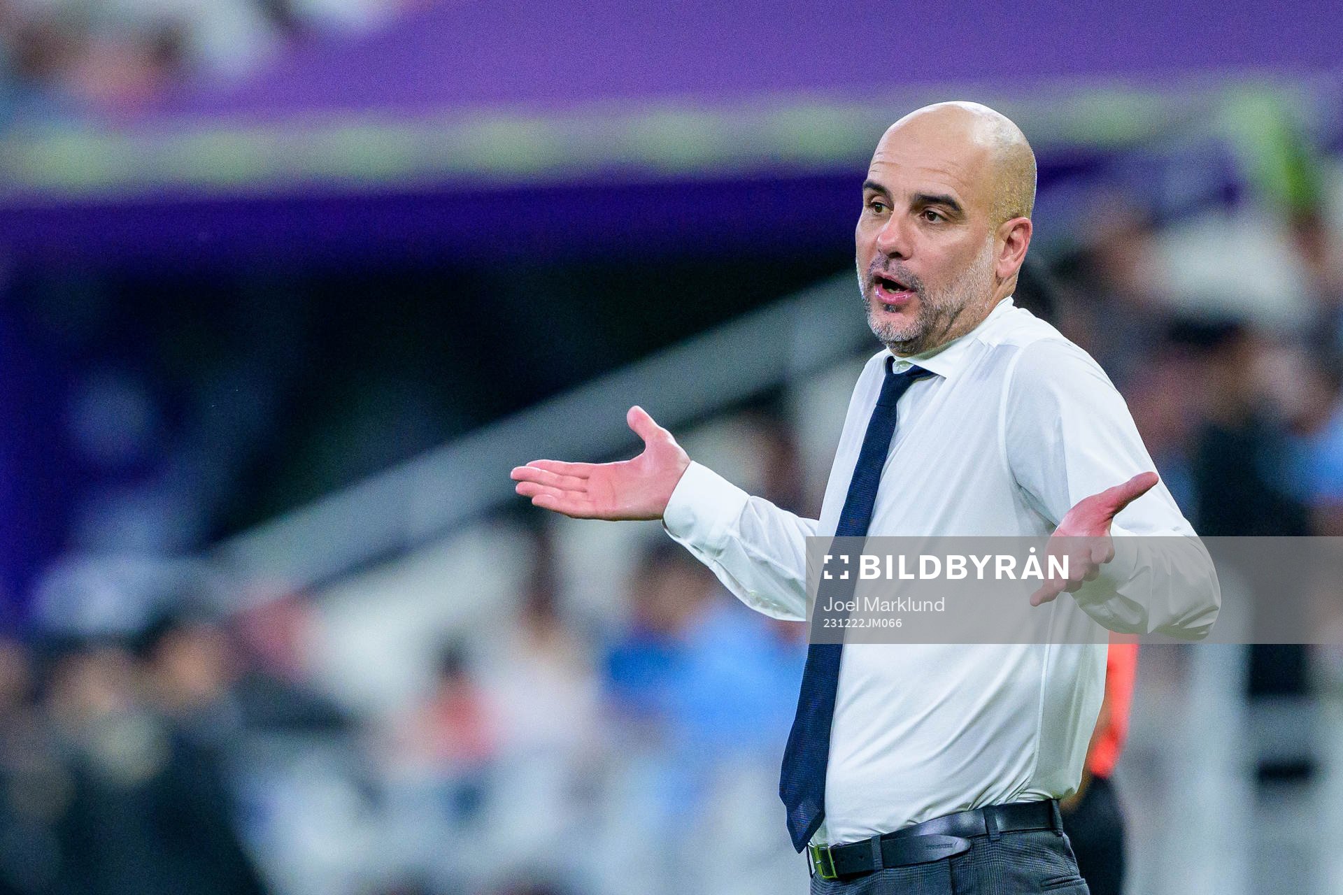 Jack Grealish and Head coach Pep Guardiola of Manchester
