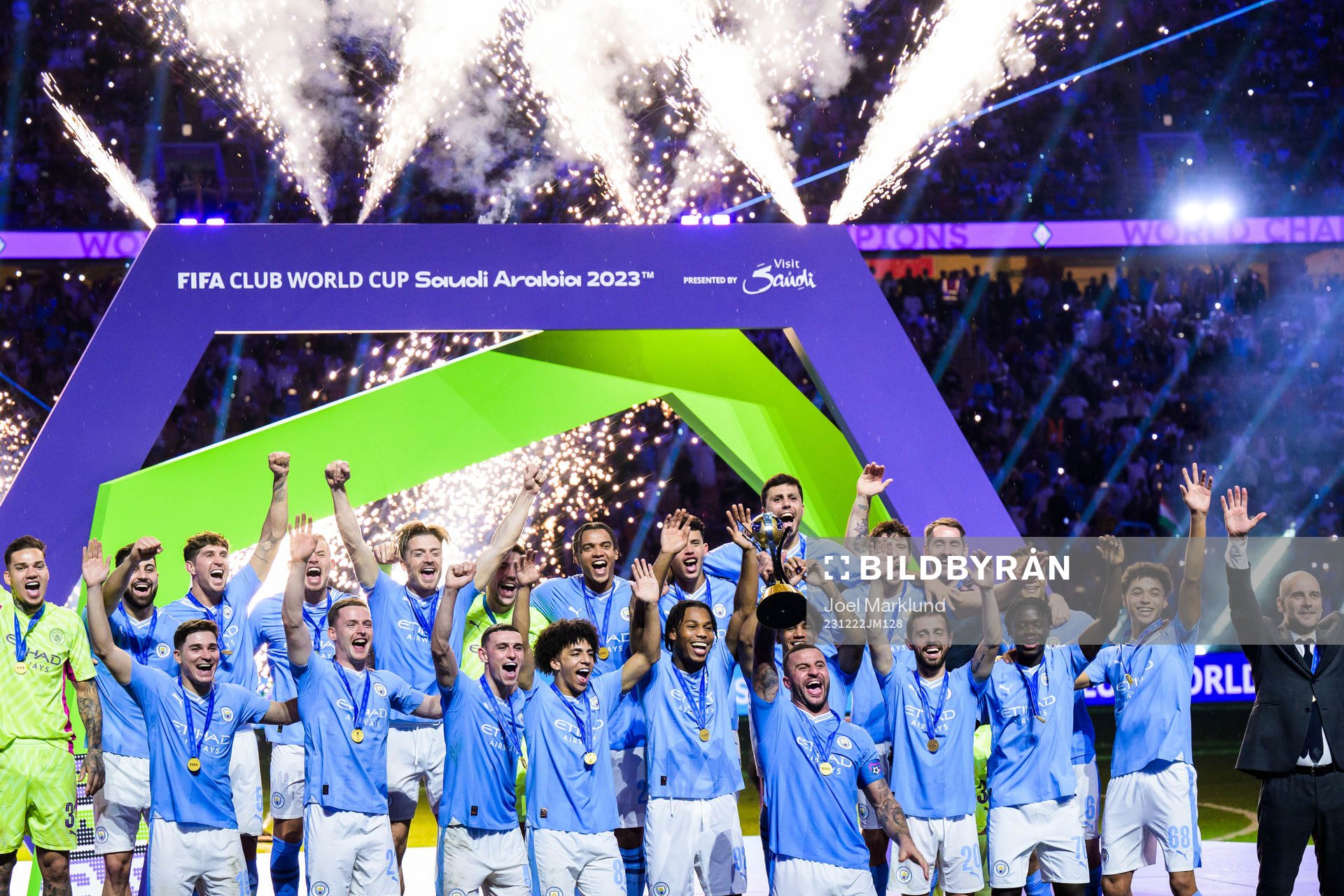 Kyle Walker of Manchester City hoists the winner’s trophy and celebrates with teammates after the FIFA Club World Cup final match between Fluminense and Manchester City on December 22, 2023 in Jeddah.