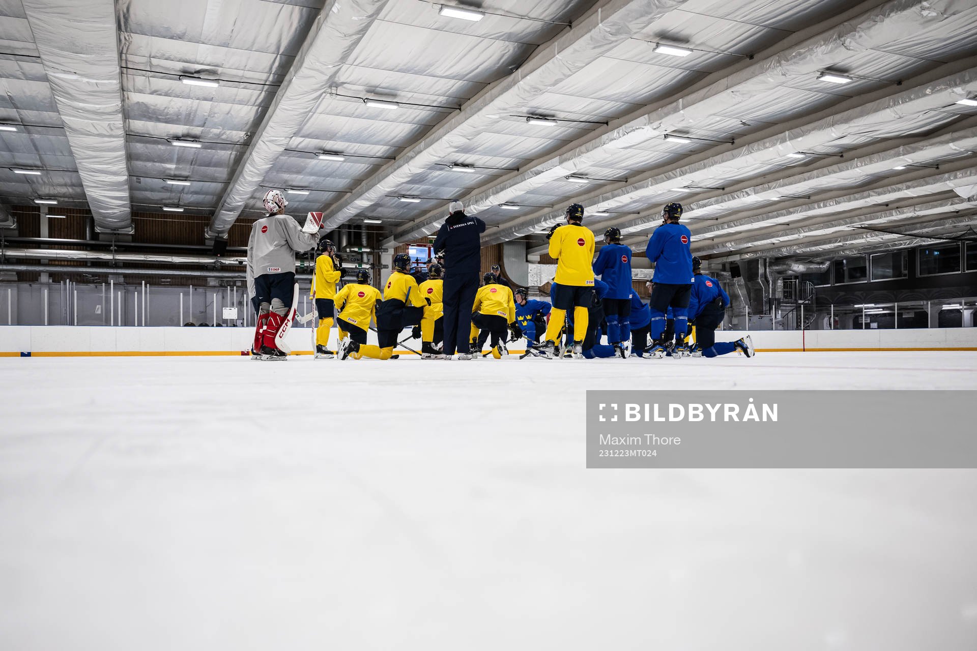 The players of Sweden gather at a practice session