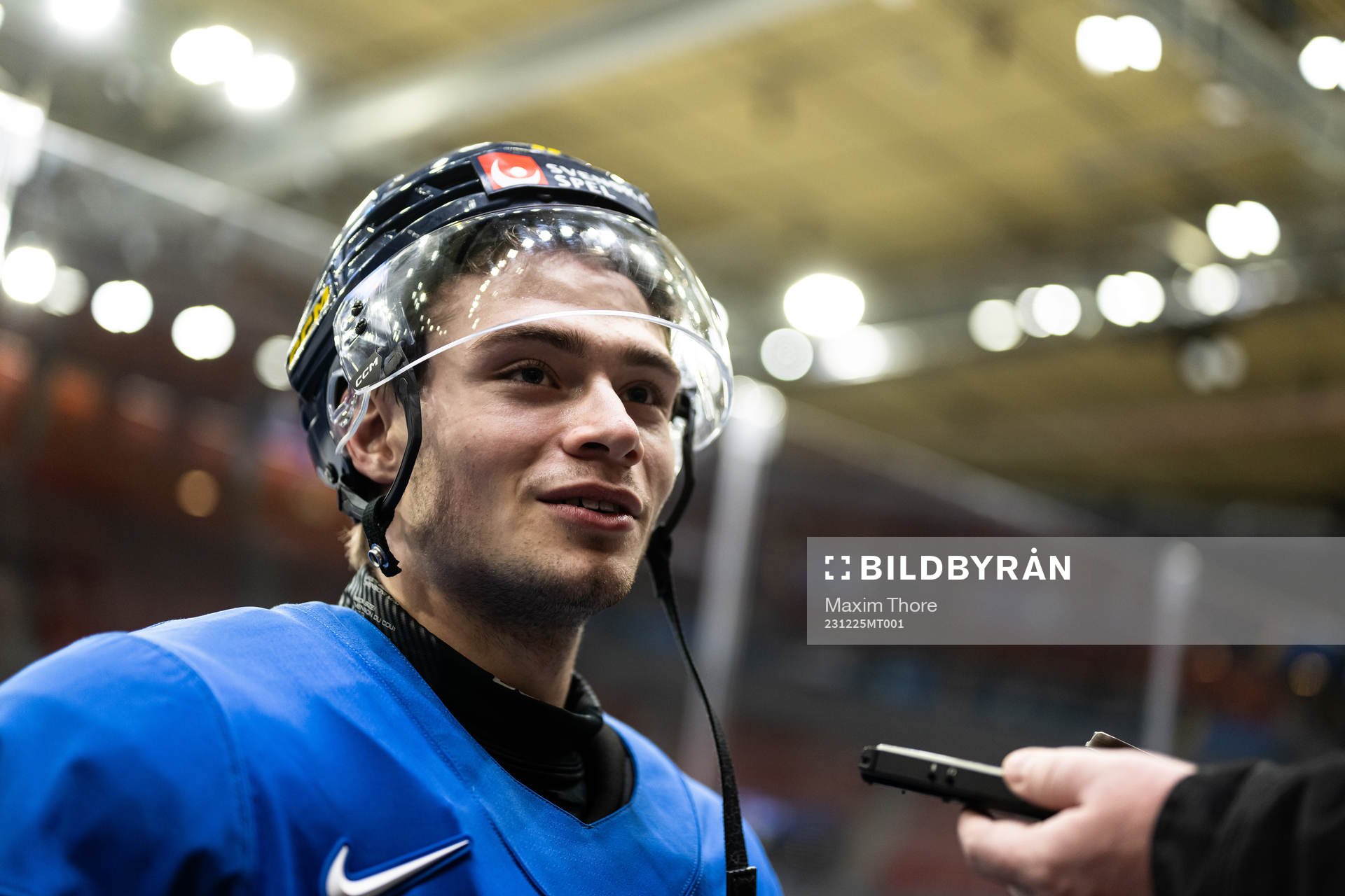 Isac Born of Sweden speaks with media