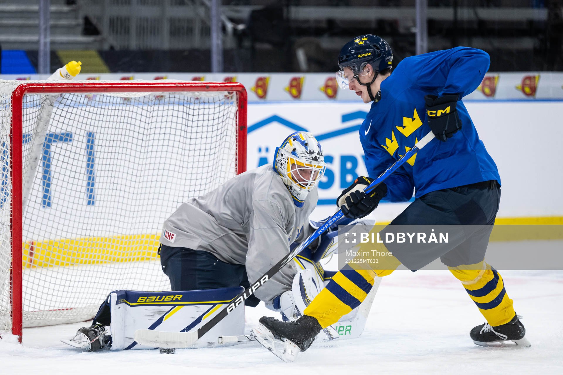 Goaltender Melker Thelin and Anton Johansson of Sweden at a