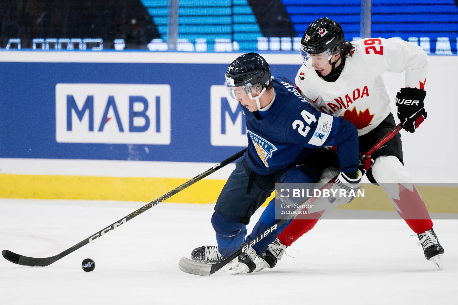 Aleksanteri Kaskimaki of Finland and Brayden Yager of Canada