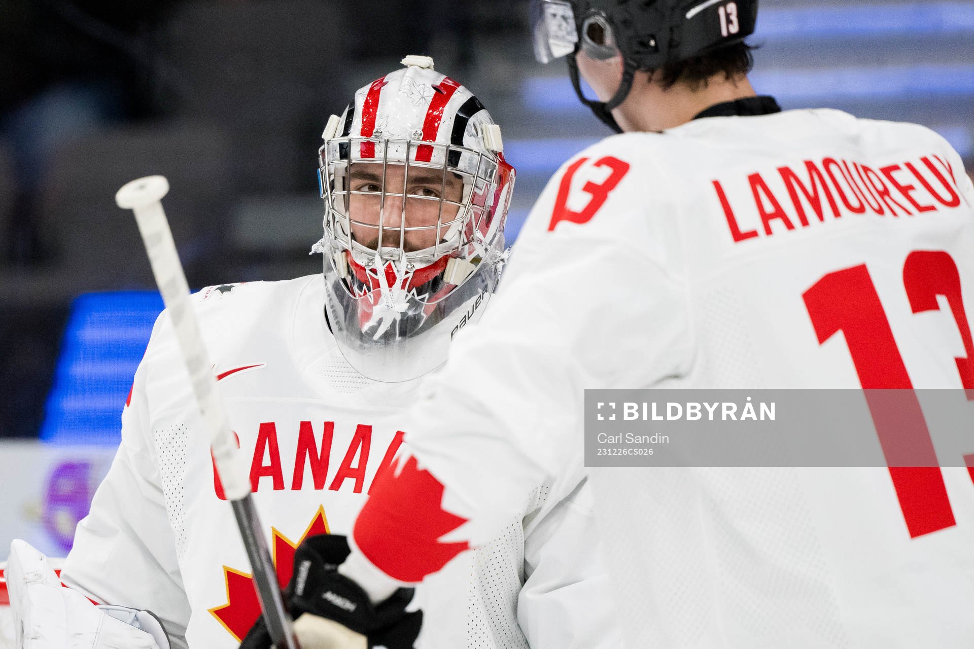 Goaltender Mathis Rousseau of Canada