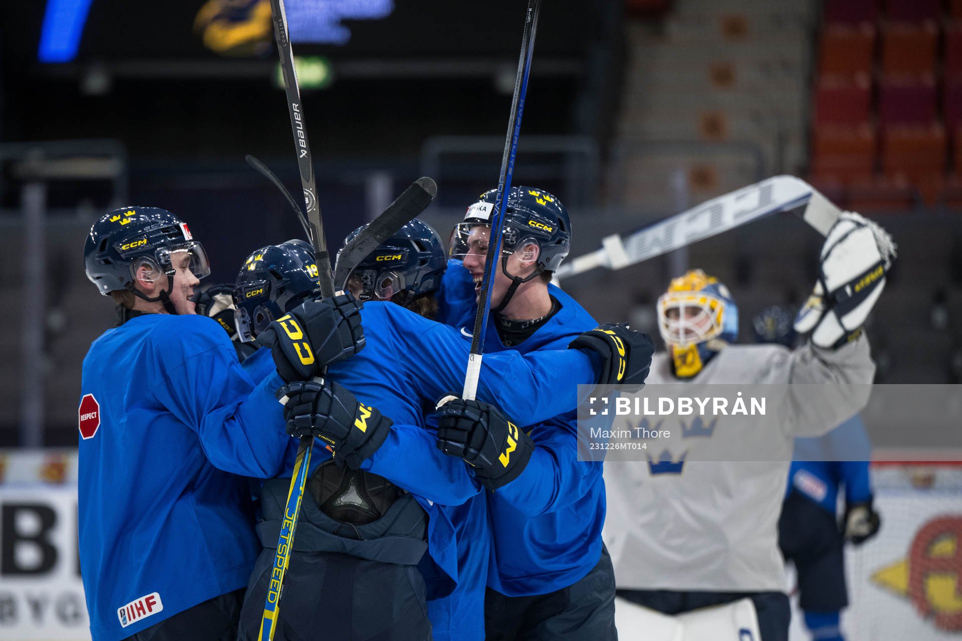 Players of Sweden celebrate at a practice session