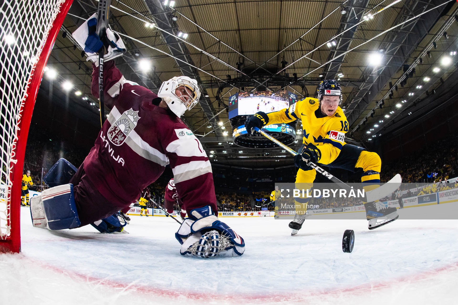 Filip Bystedt of Sweden scores the 4-0 goal behind Deivs