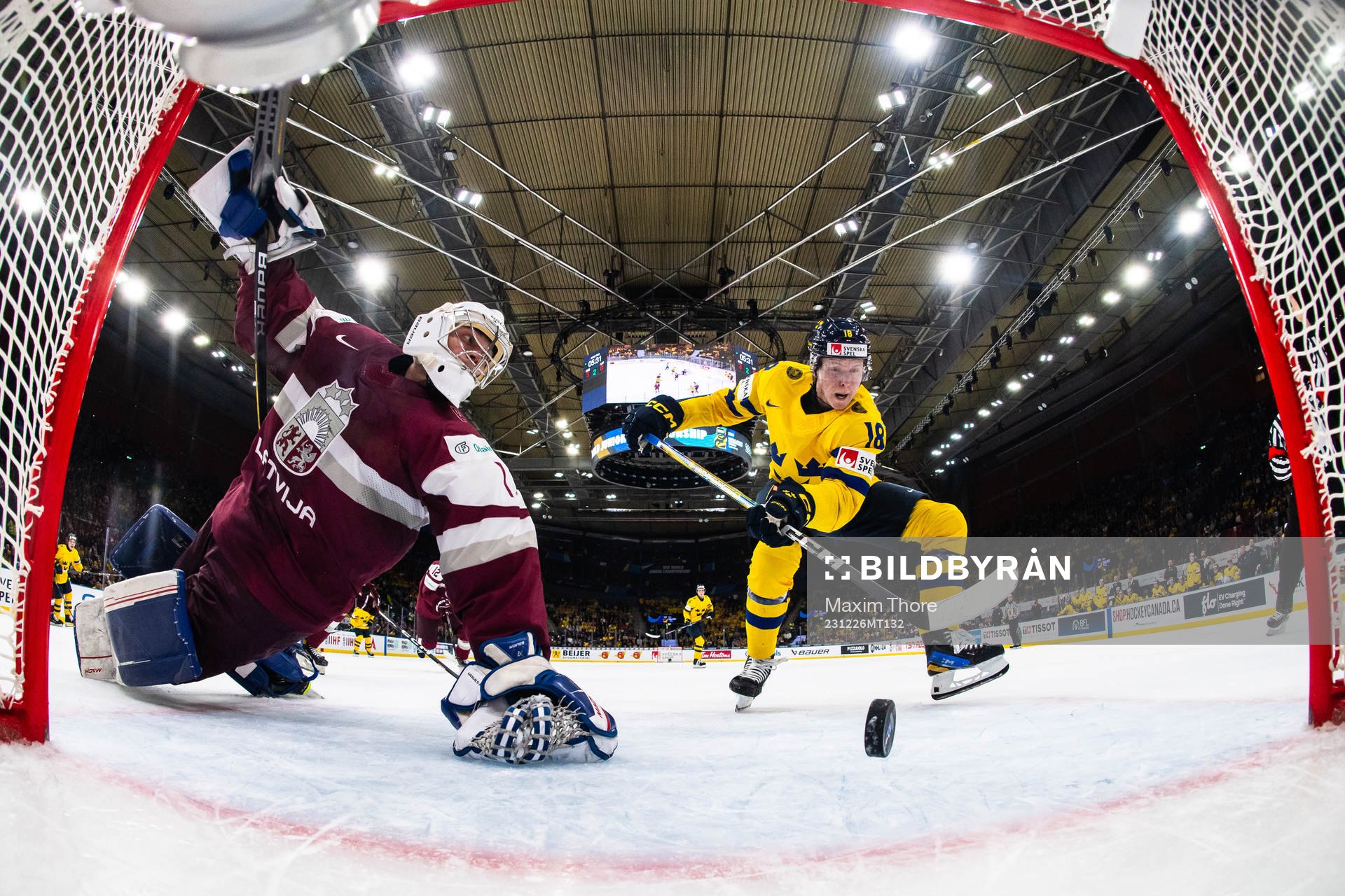 Filip Bystedt of Sweden scores the 4-0 goal behind Deivs