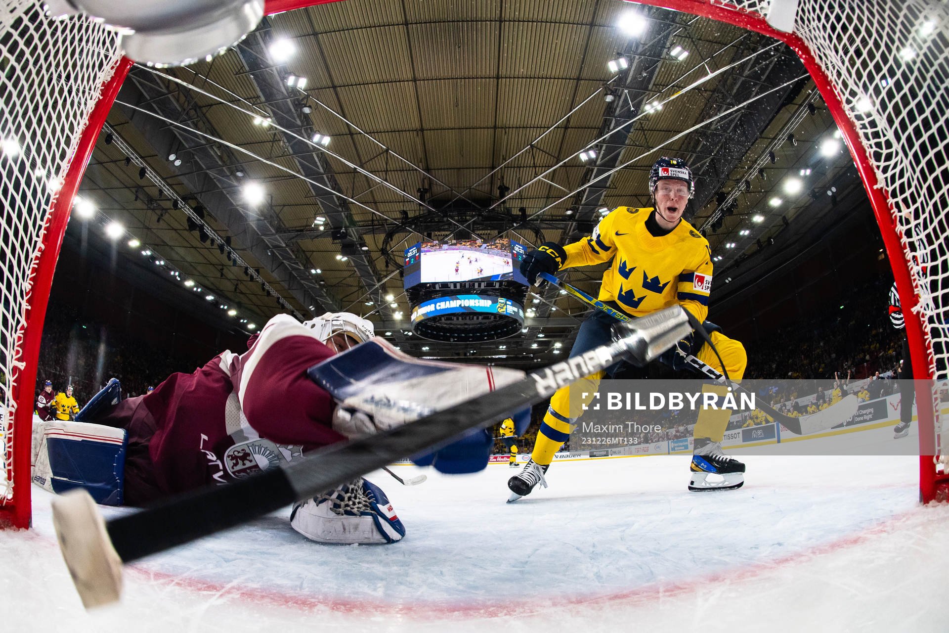 Filip Bystedt of Sweden scores the 4-0 goal behind Deivs