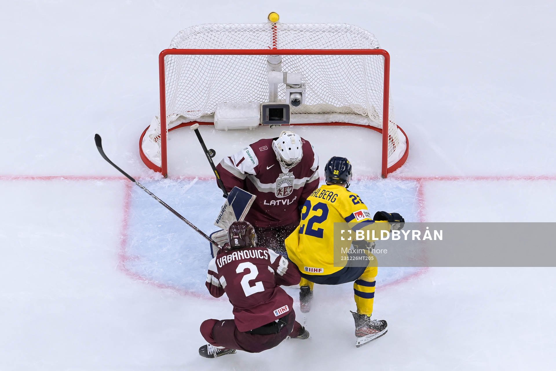 Anton Wahlberg of Sweden against goaltender Deivs Rolovs of