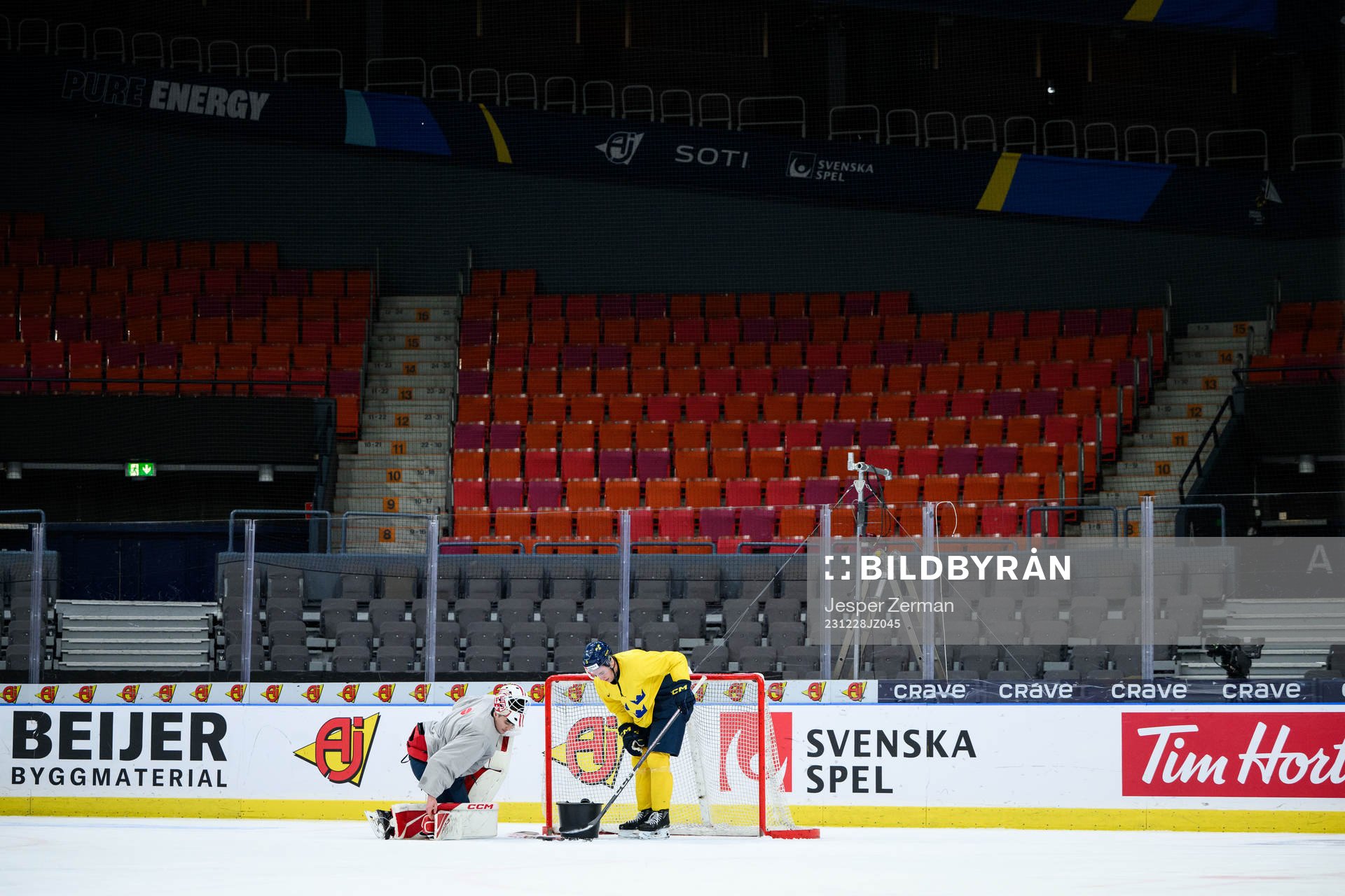 goaltender Kevin Reidler and Elias Salomonsson of Sweden at