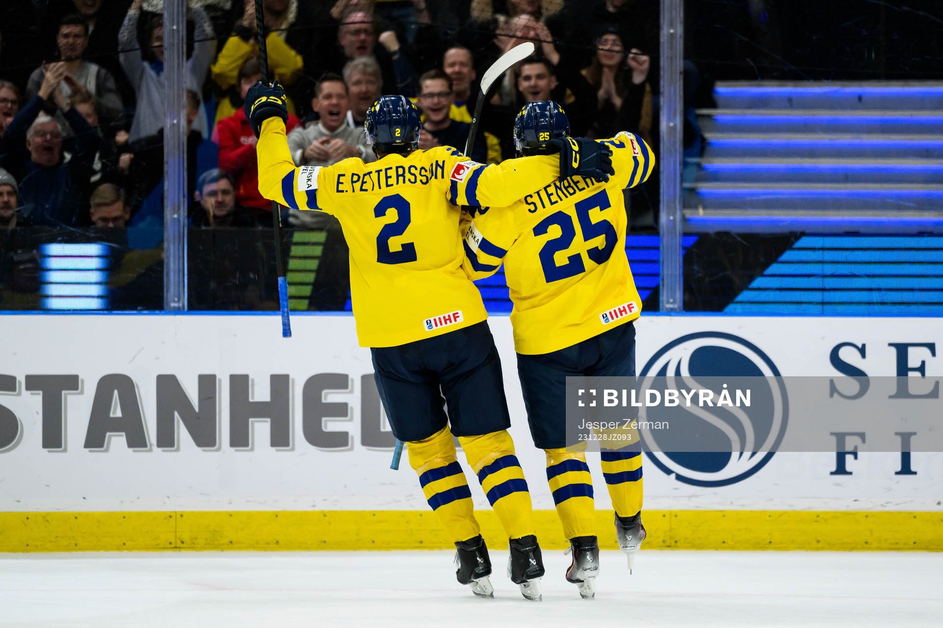 Elias Pettersson and Otto Stenberg of Sweden celebrate the