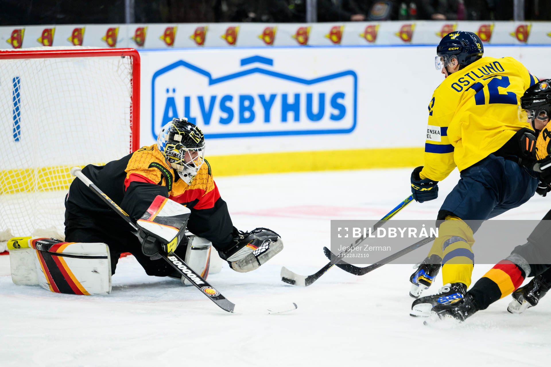 Goaltender Matthias Bittner of Germany and Noah Östlund of