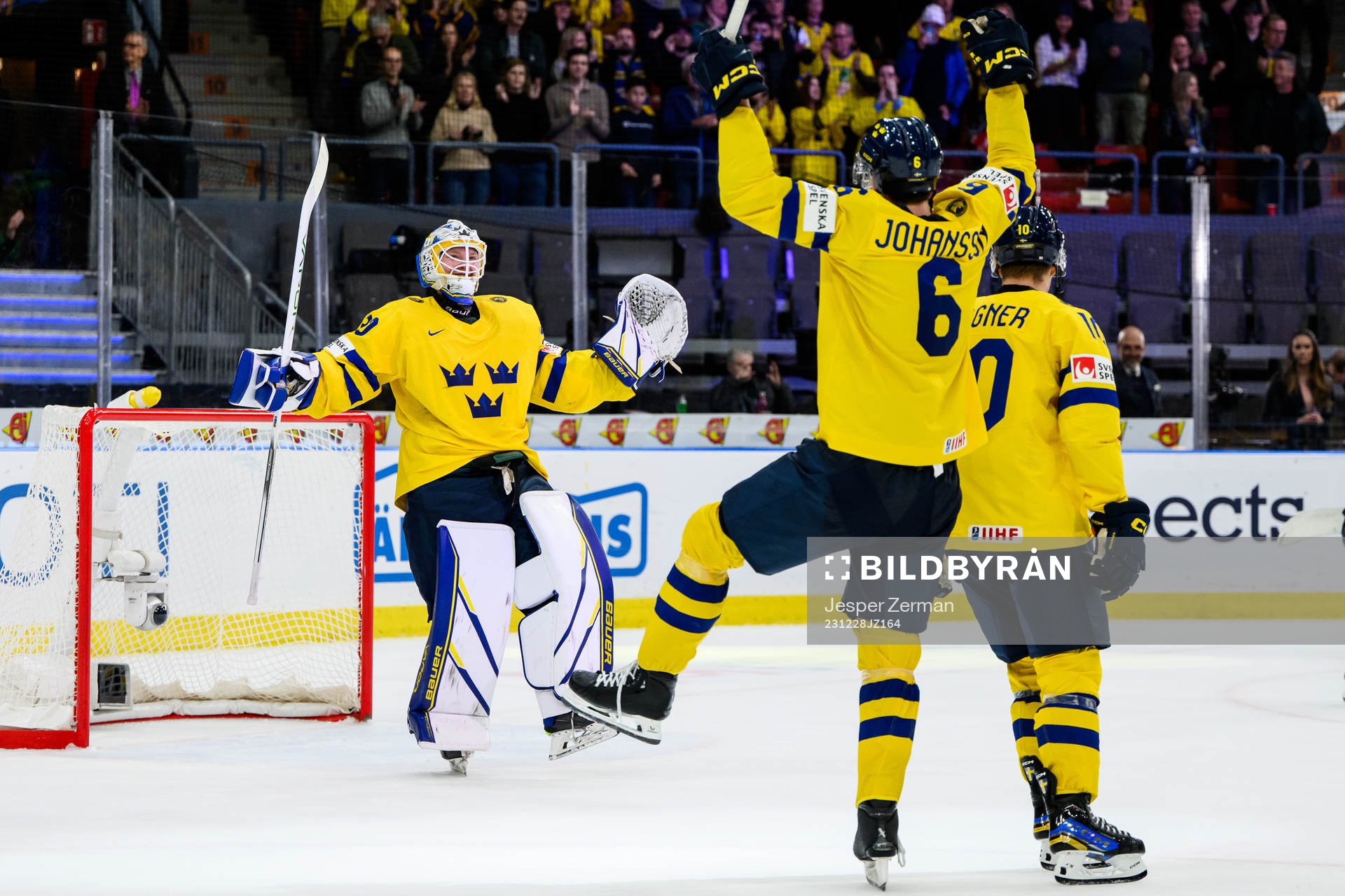 Goaltender Melker Thelin and Anton Johansson of Sweden