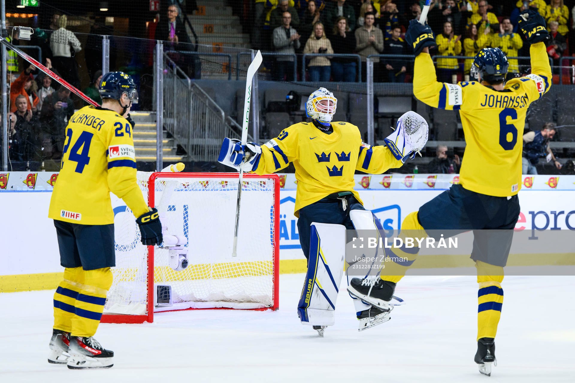 goaltender Melker Thelin and Anton Johansson of Sweden