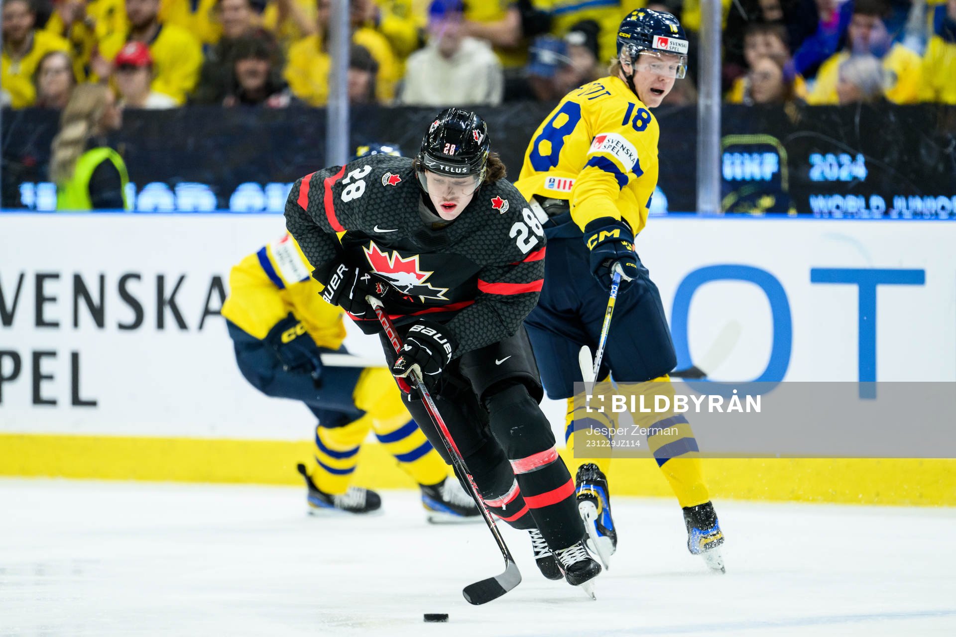 Conor Geekie of Canada and Filip Bystedt of Sweden
