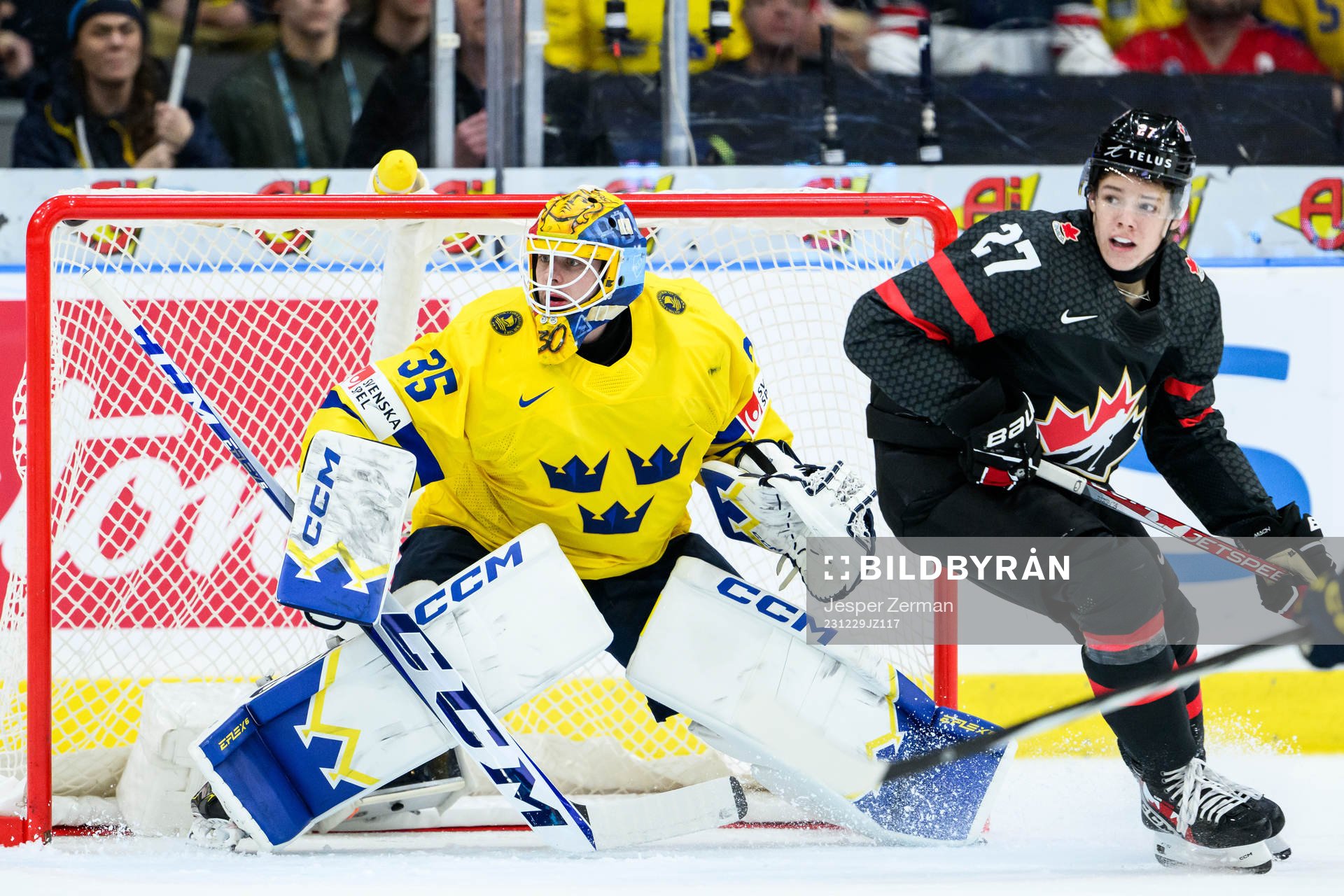 Goaltender Hugo Hävelid of Sweden and Easton Cowan of