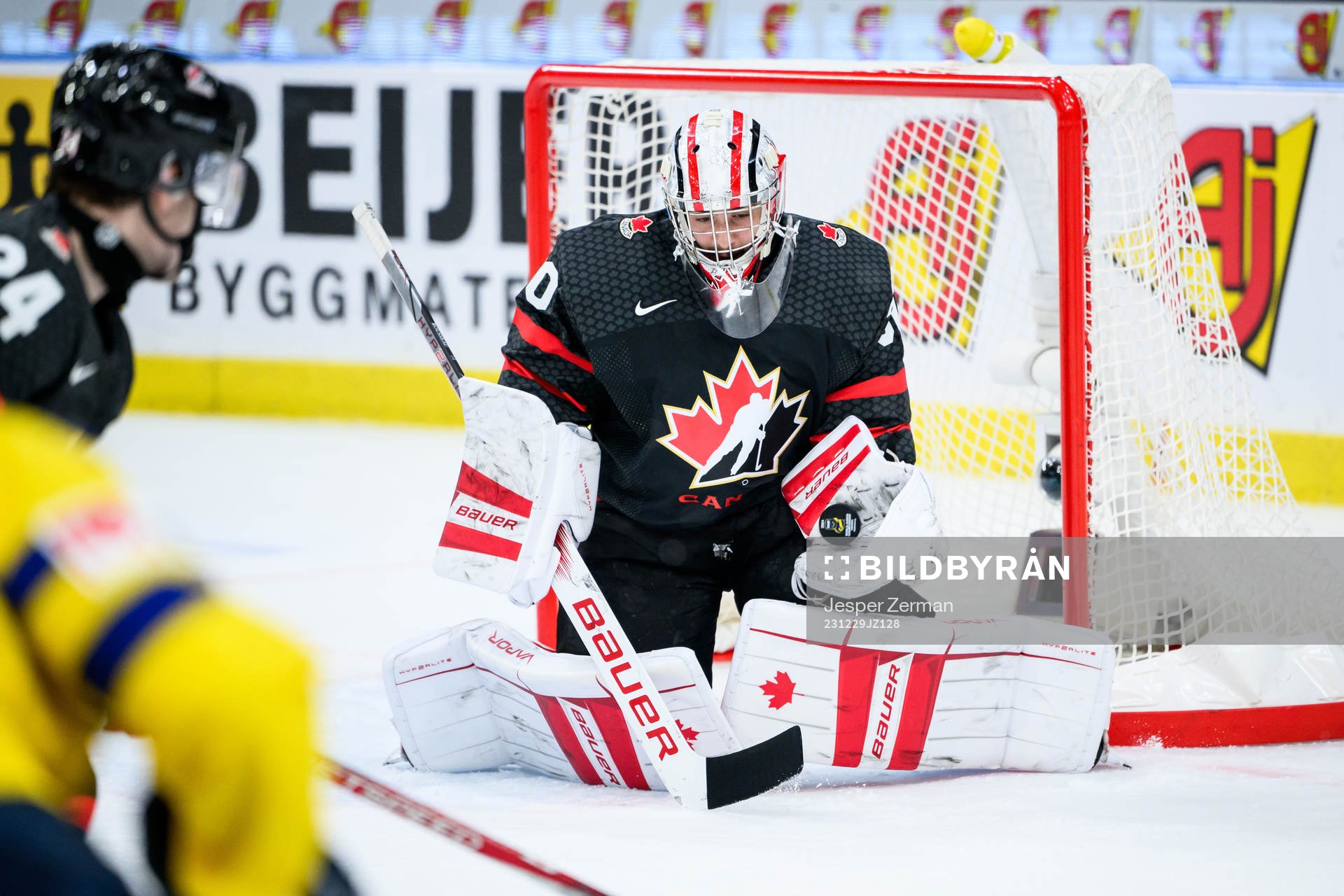 Goaltender Mathis Rousseau of Canada