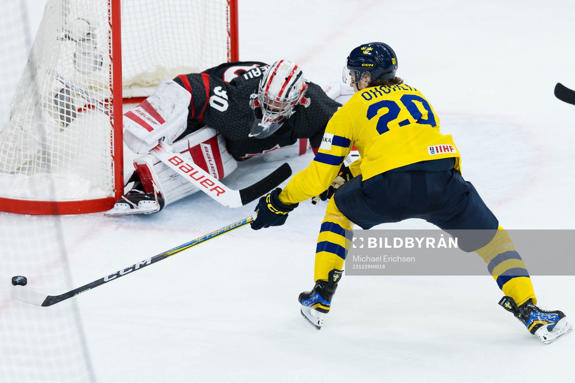 Goalkeeper Mathis Rousseau of Canada and Liam Öhgren of