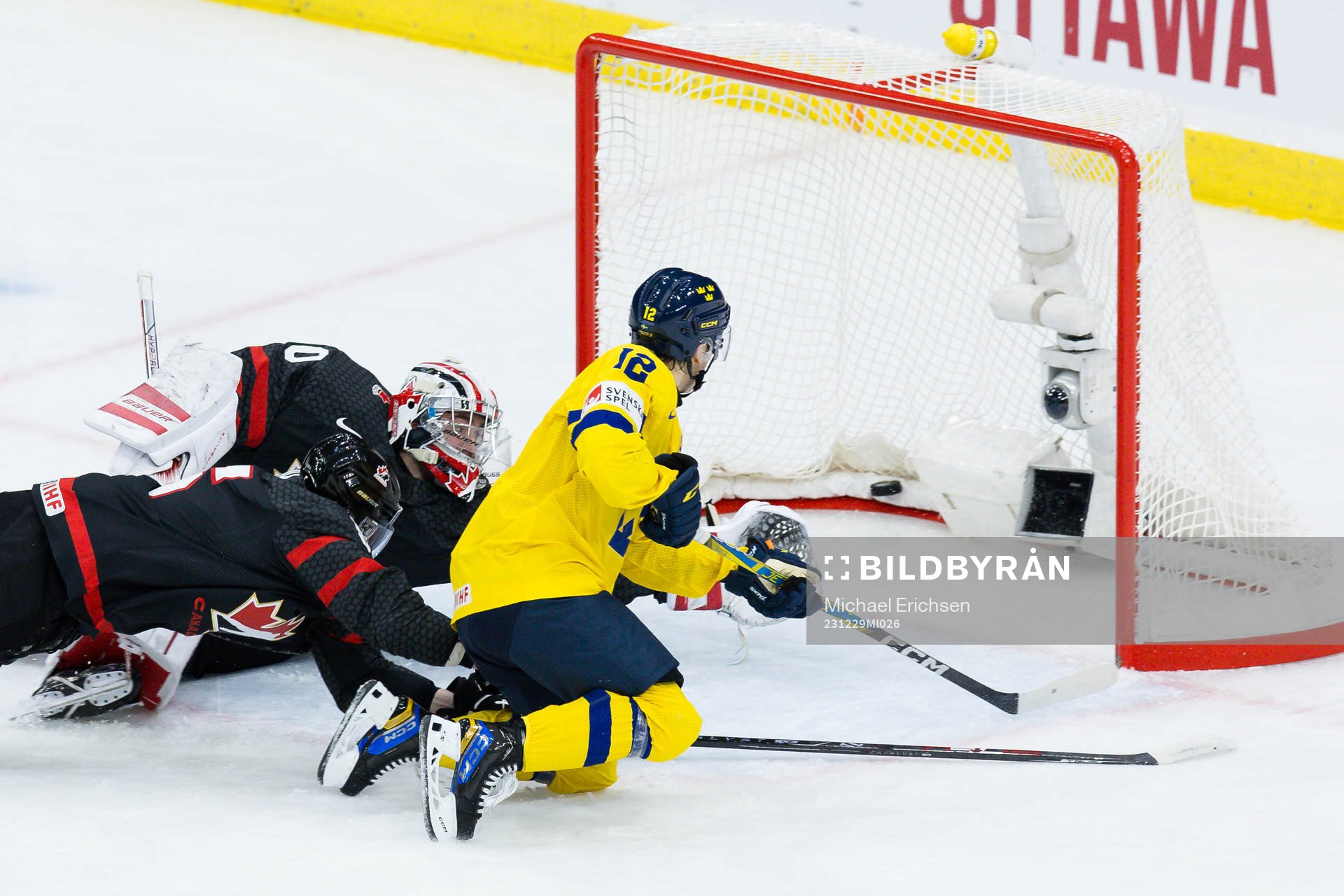 Noah Östlund of Sweden scores the 0-2 goal behind