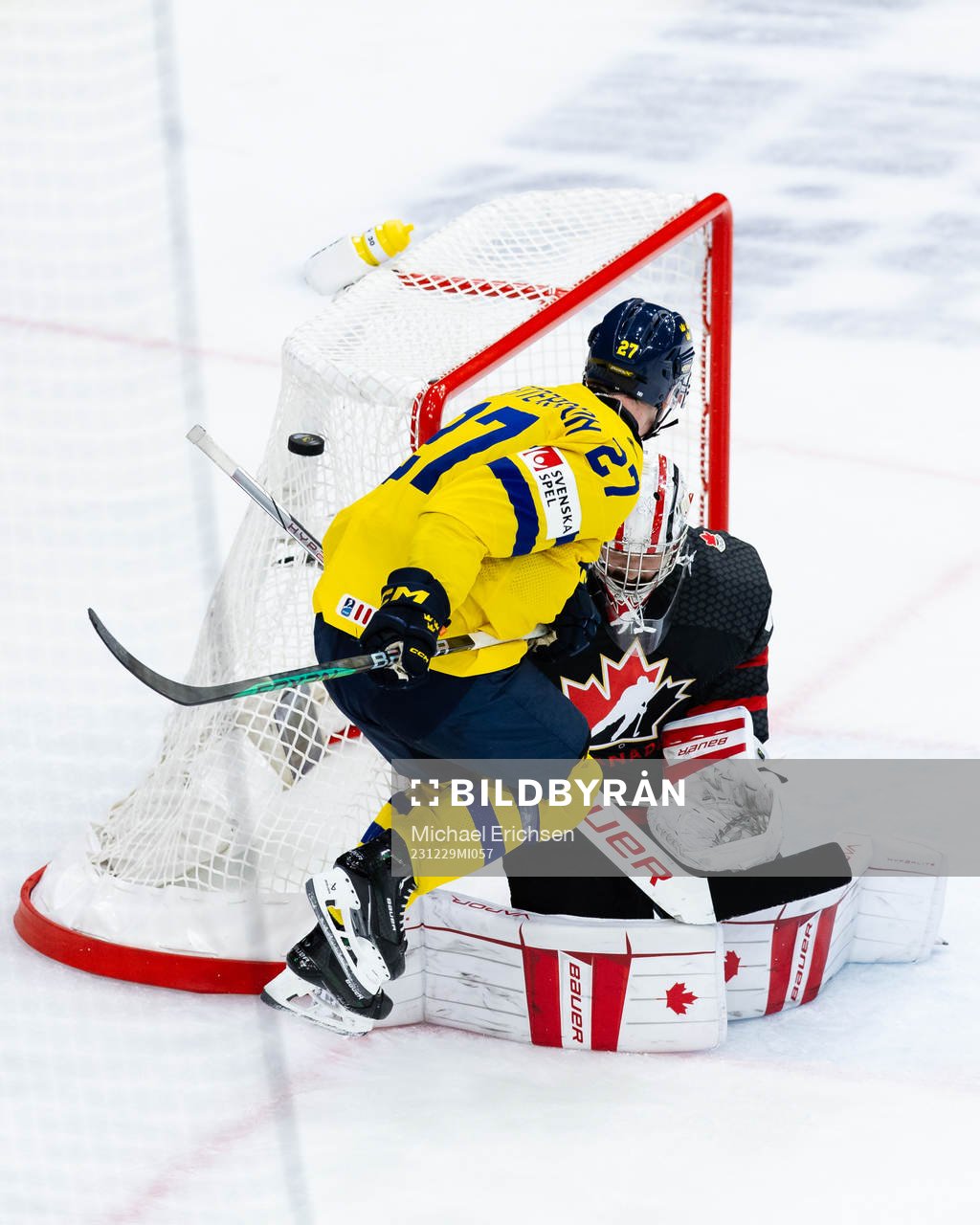 Oskar Pettersson of Sweden and goalkeeper Mathis Rousseau