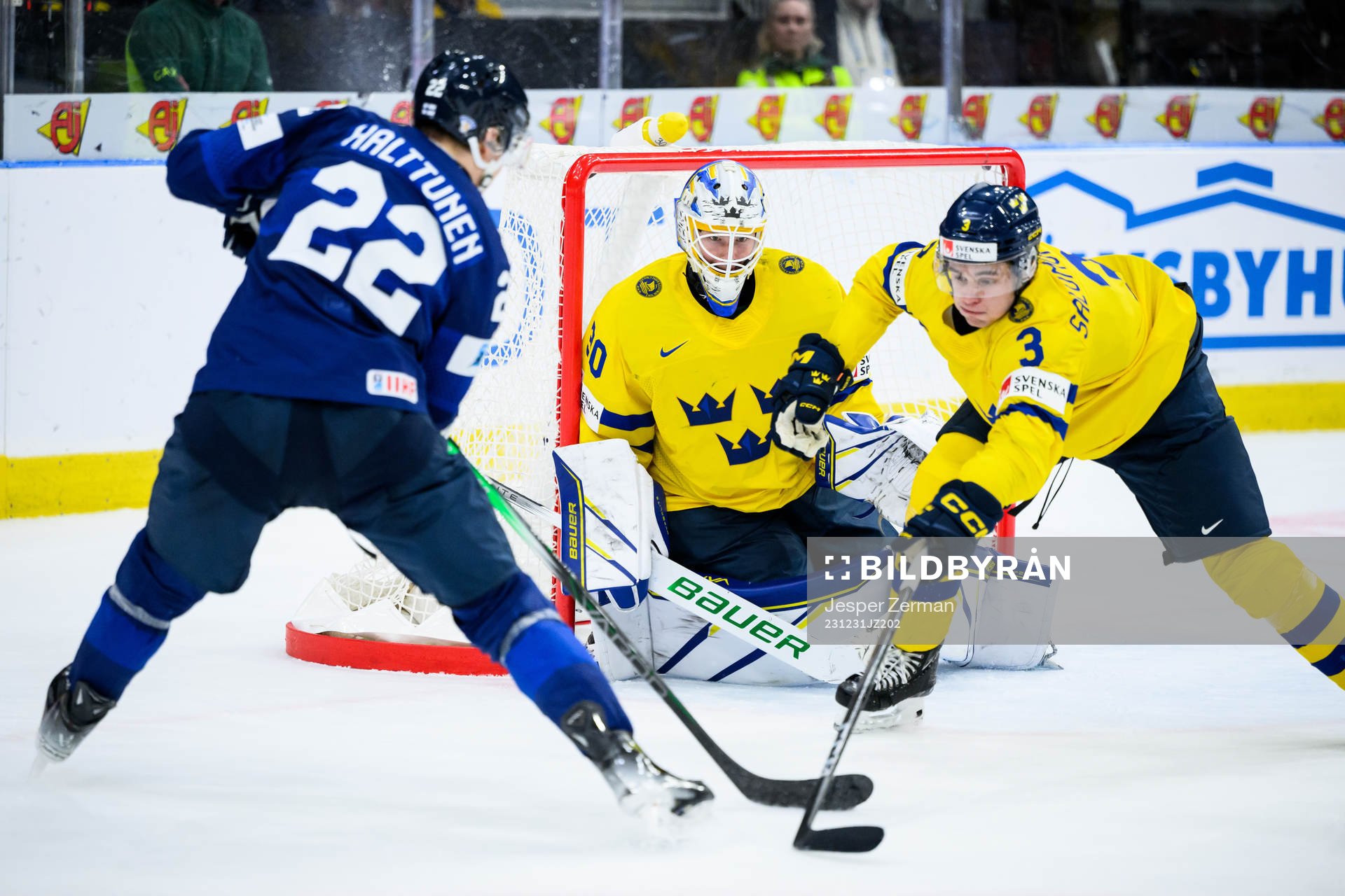 goaltender Melker Thelin and Elias Salomonsson of Sweden