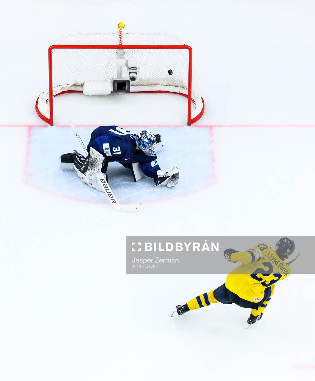 Jonathan Lekkerimäki of Sweden scores