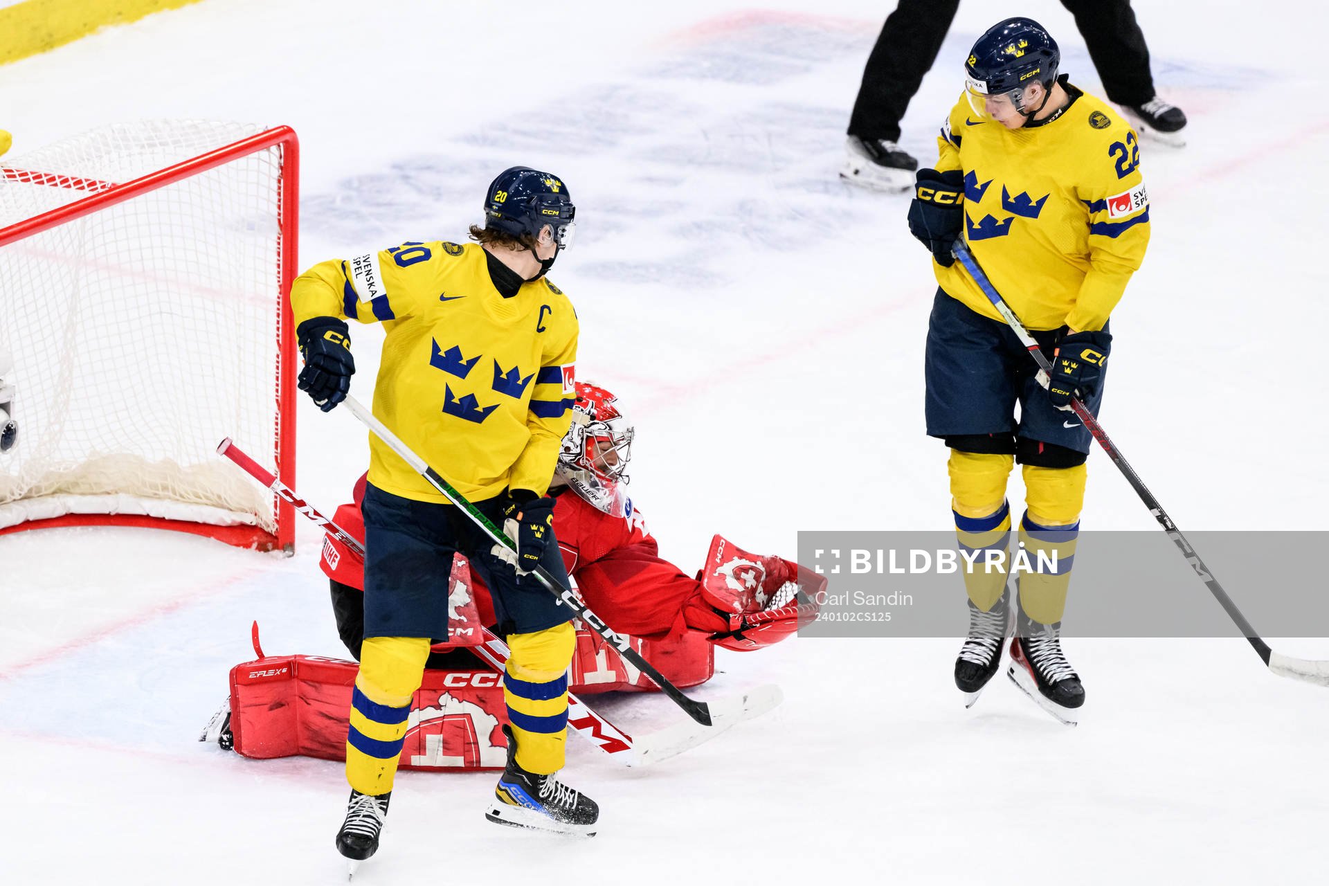Goaltender Alessio Beglieri of Switzerland against Liam