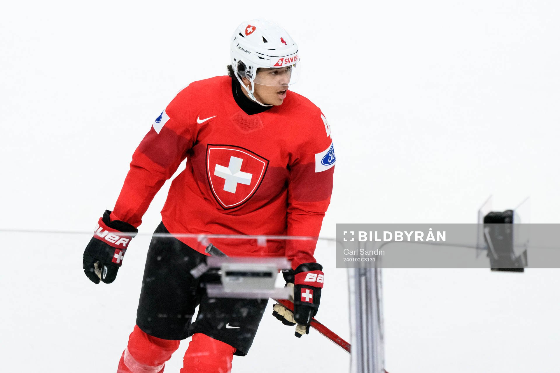 Rodwin Dionicio of Switzerland looks dejected