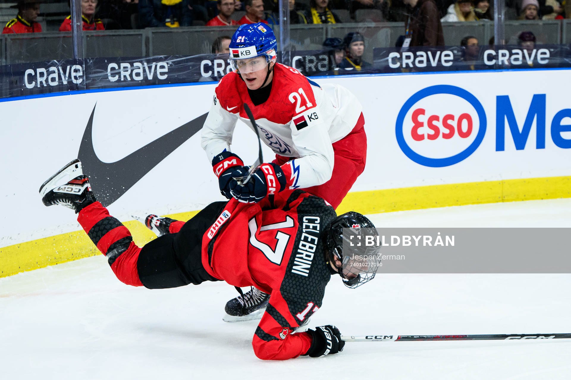 Macklin Celebrini of Canada and Jakub Stancl of Czech