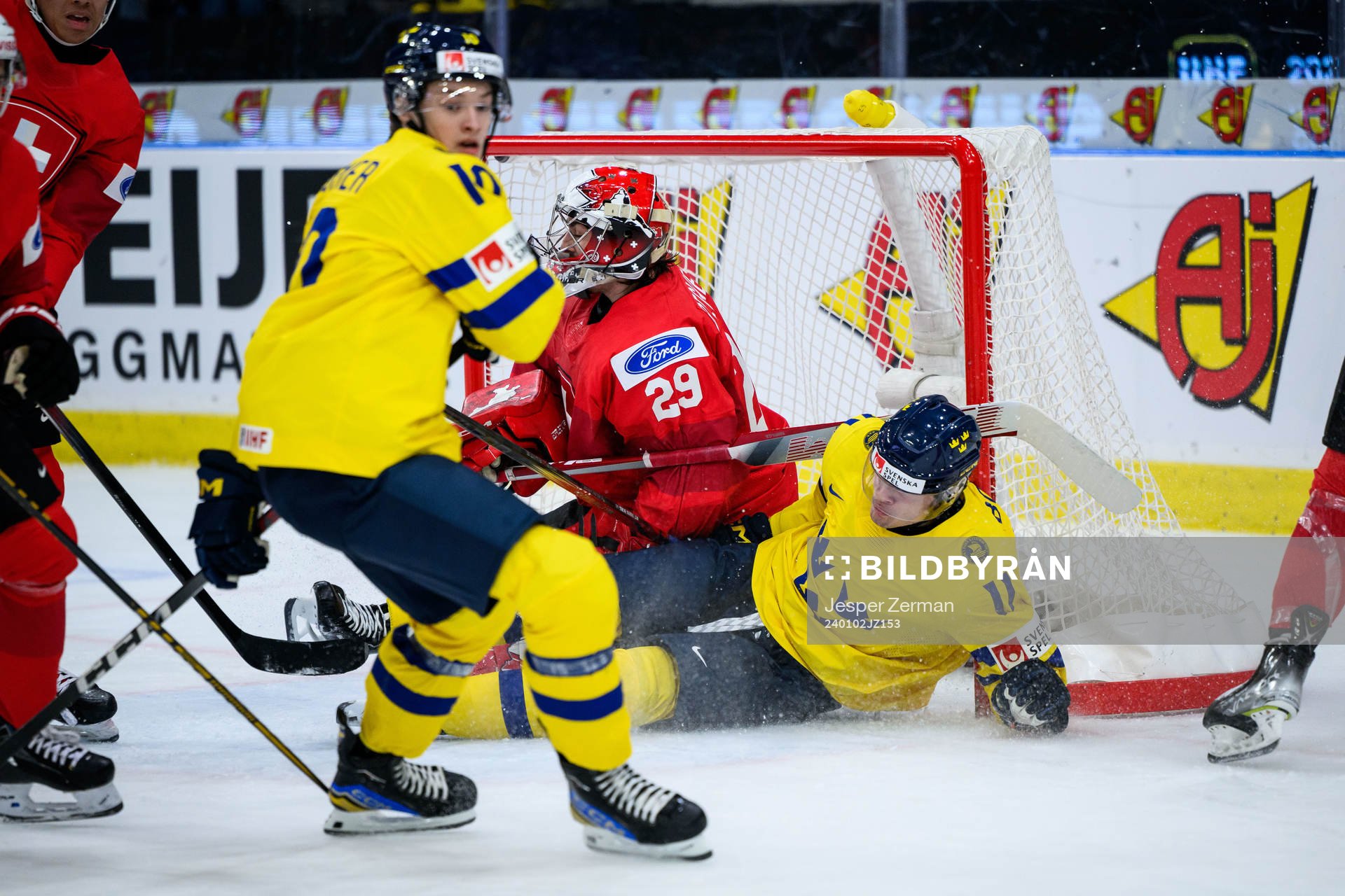 Isac Born of Sweden and goaltender Alessio Beglieri of