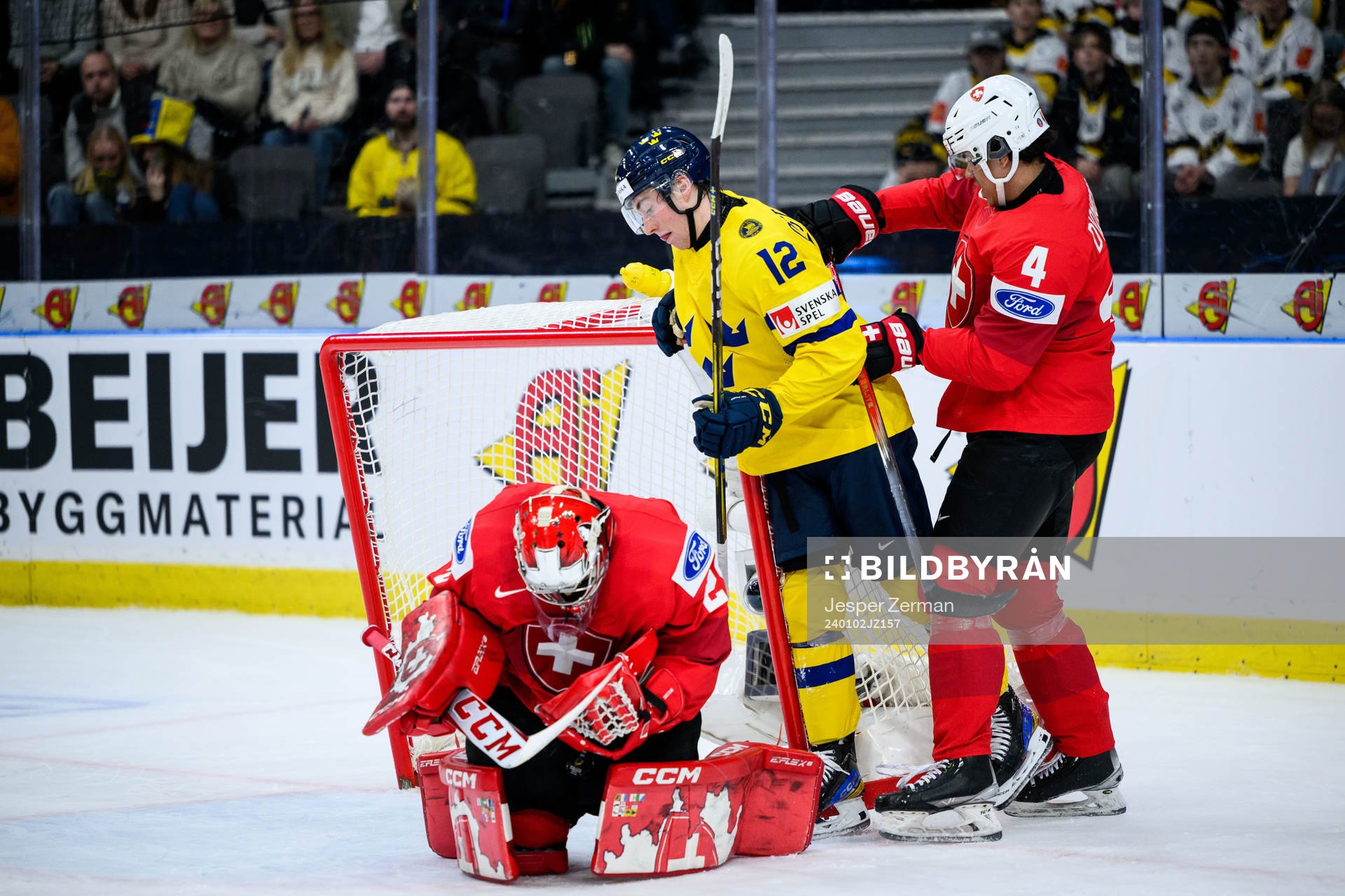 Noah Östlund of Sweden against goaltender Alessio Beglieri