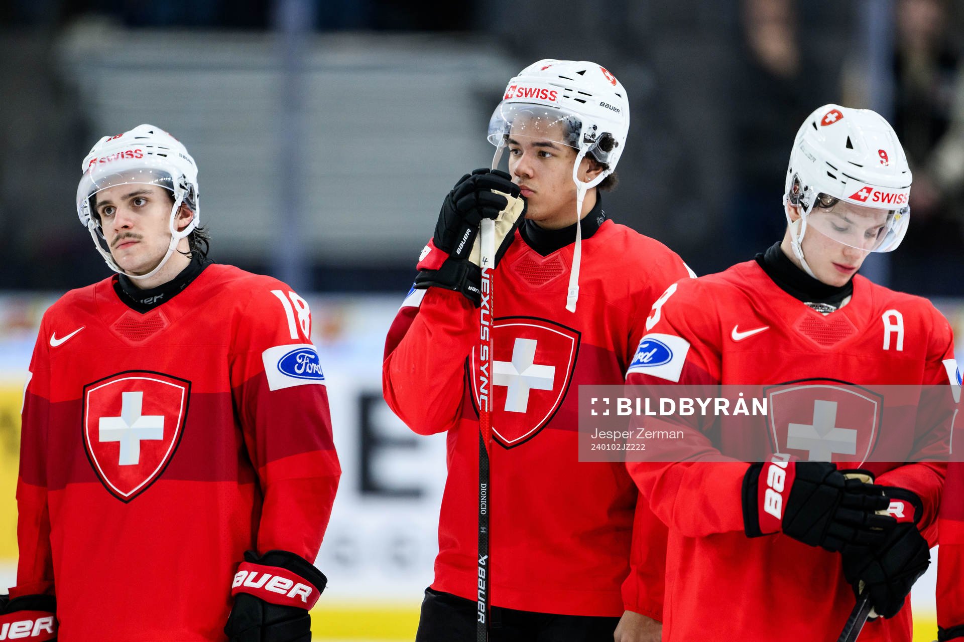 Rodwin Dionicio of Switzerland looks dejected