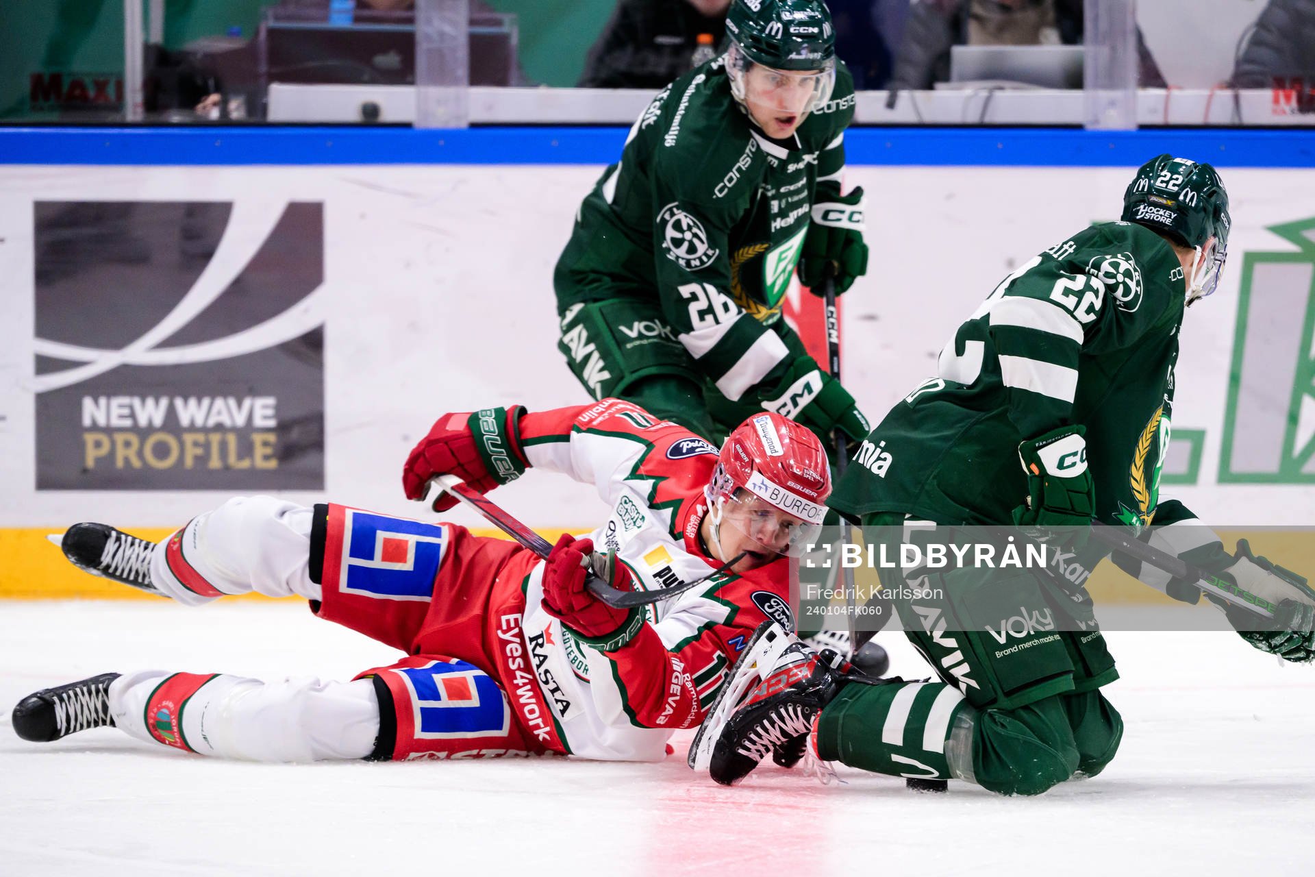 Frölundas Erik Borg och Färjestads Joel Nyström och Per
