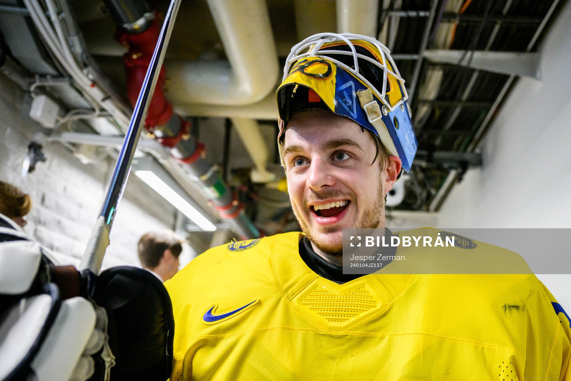 Goaltender Hugo Hävelid of Sweden celebrates