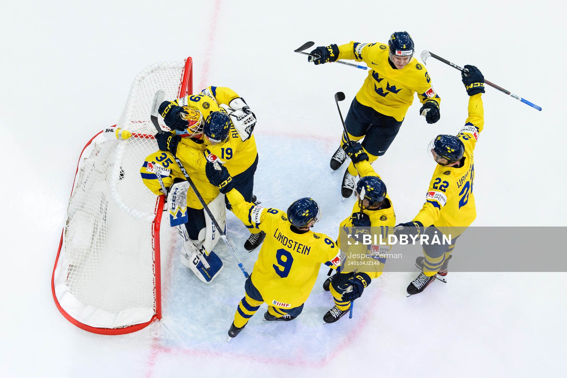 goaltender Hugo Hävelid of Sweden celebrate ith teammates