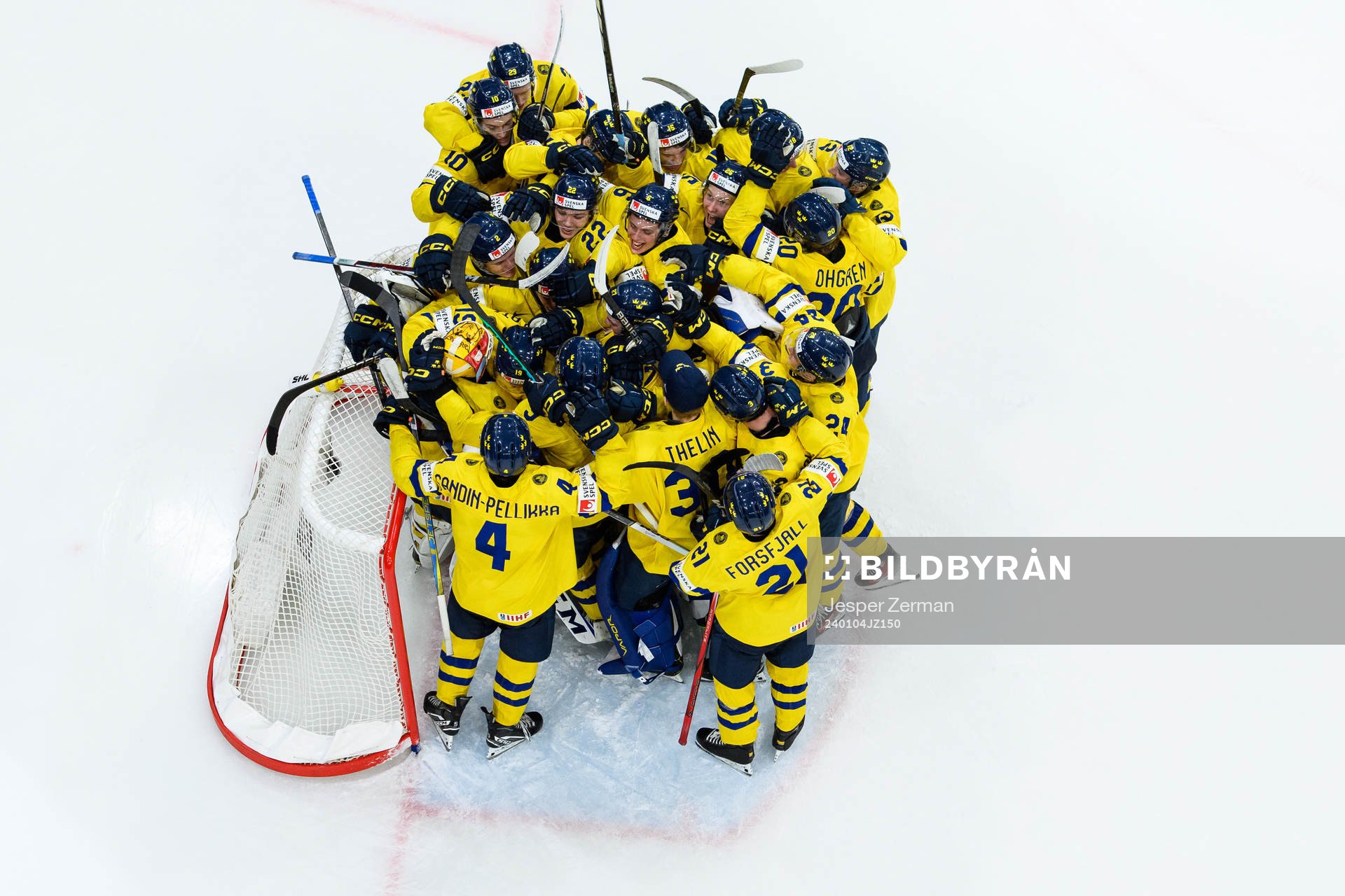 goaltender Hugo Hävelid of Sweden celebrate ith teammates