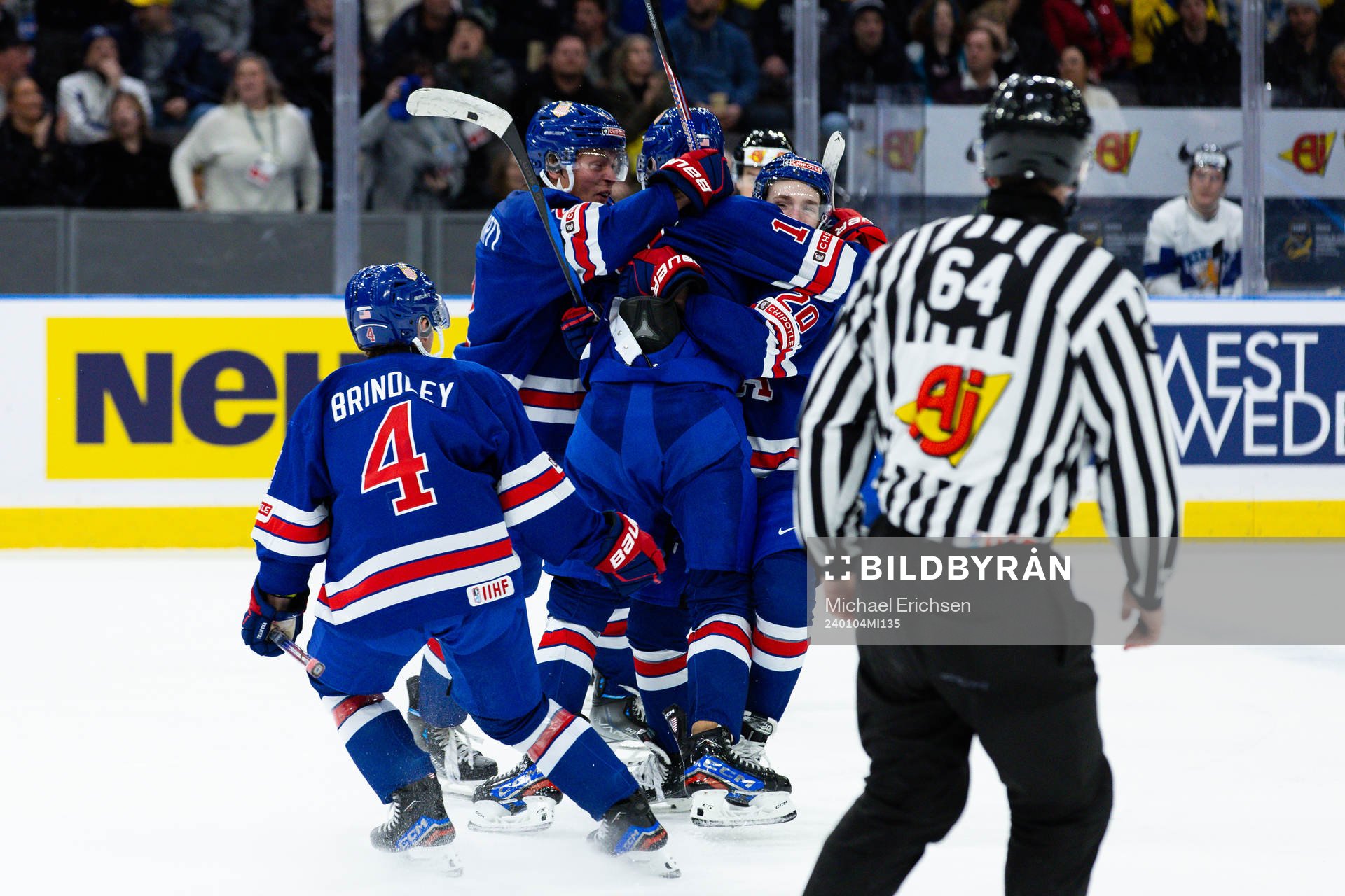 Cutter Gauthier of USA celebrates scoring 3-2 with team