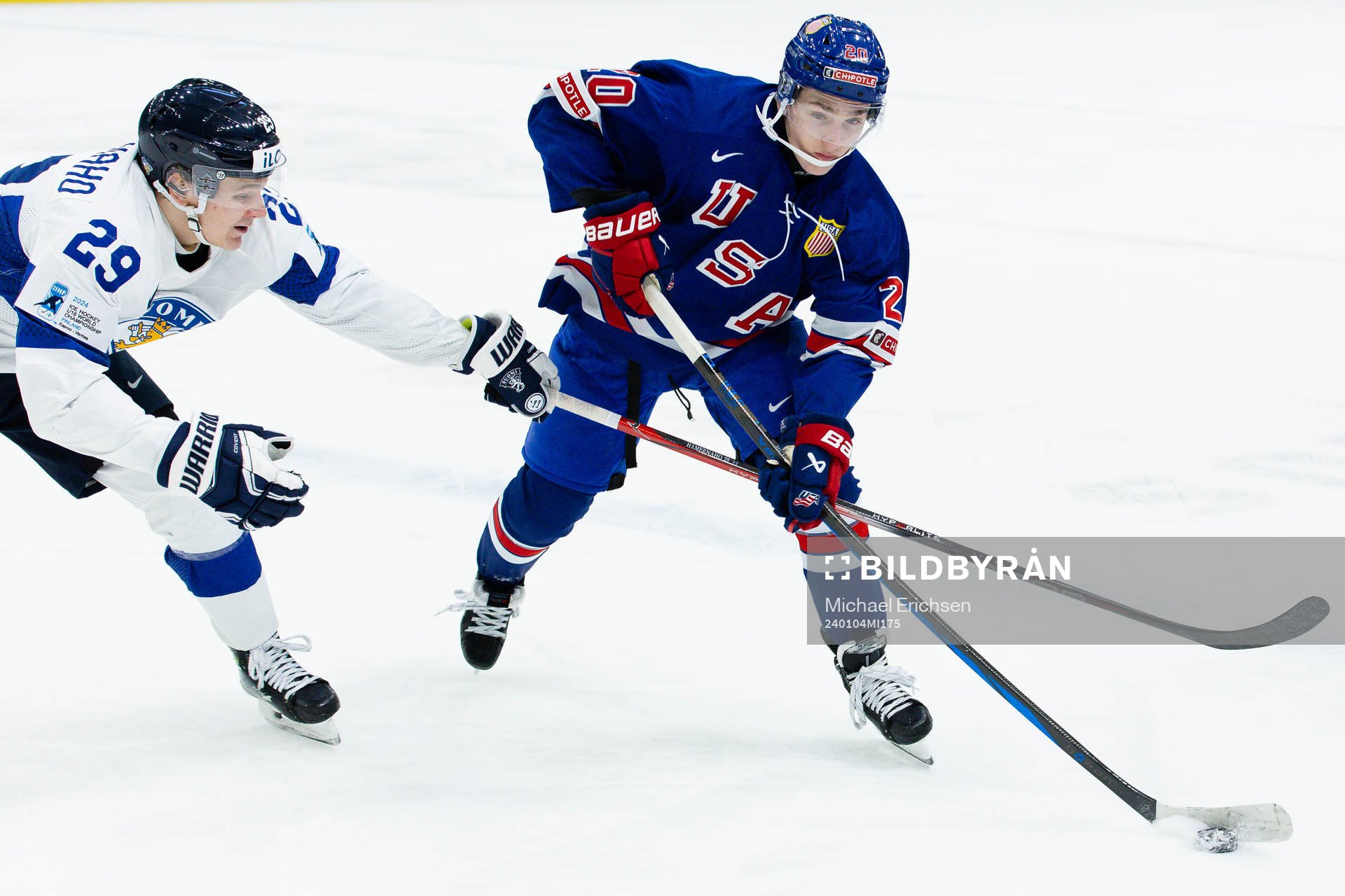 Lenni Hameenaho of Finland and Lane Hutson of USA