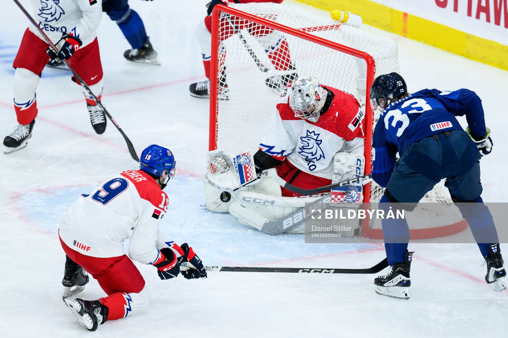 Goaltender Jakub Vondras of Czech Republic and Jani Nyman