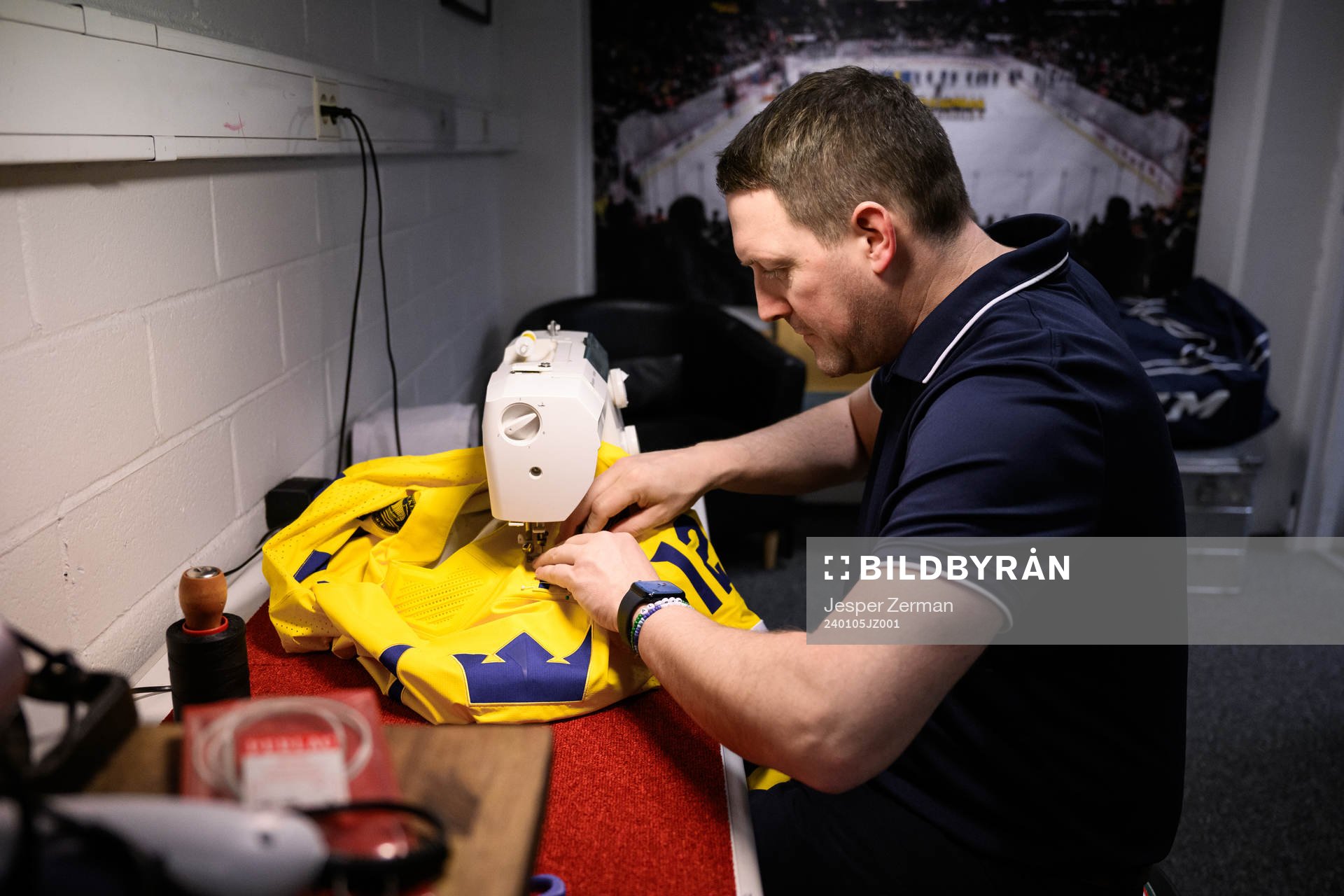 Equipment manager Daniel Nilsson of Sweden preparing a