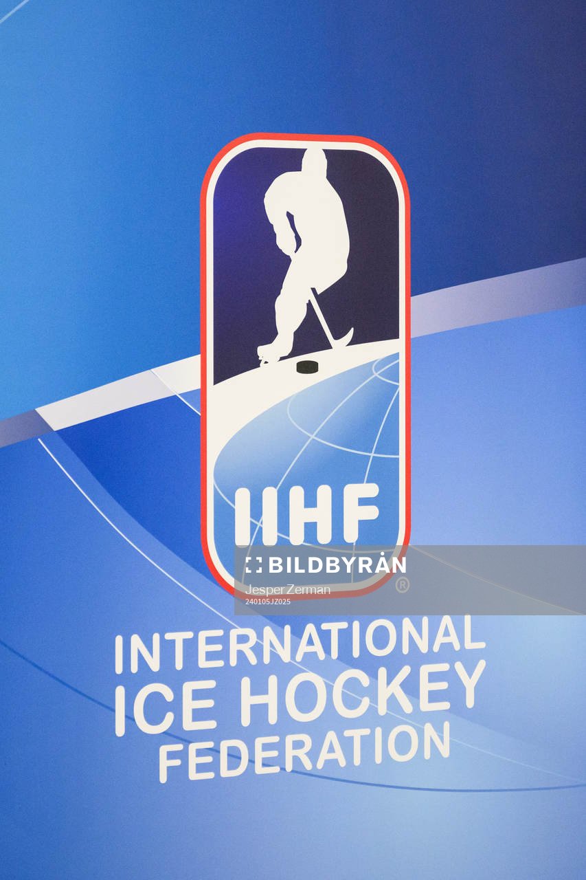 The IIHF logo at a press conference