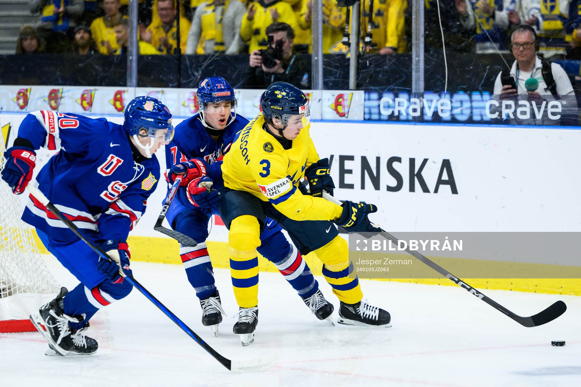Lane Hutson and Ryan Chesley of USA against Elias