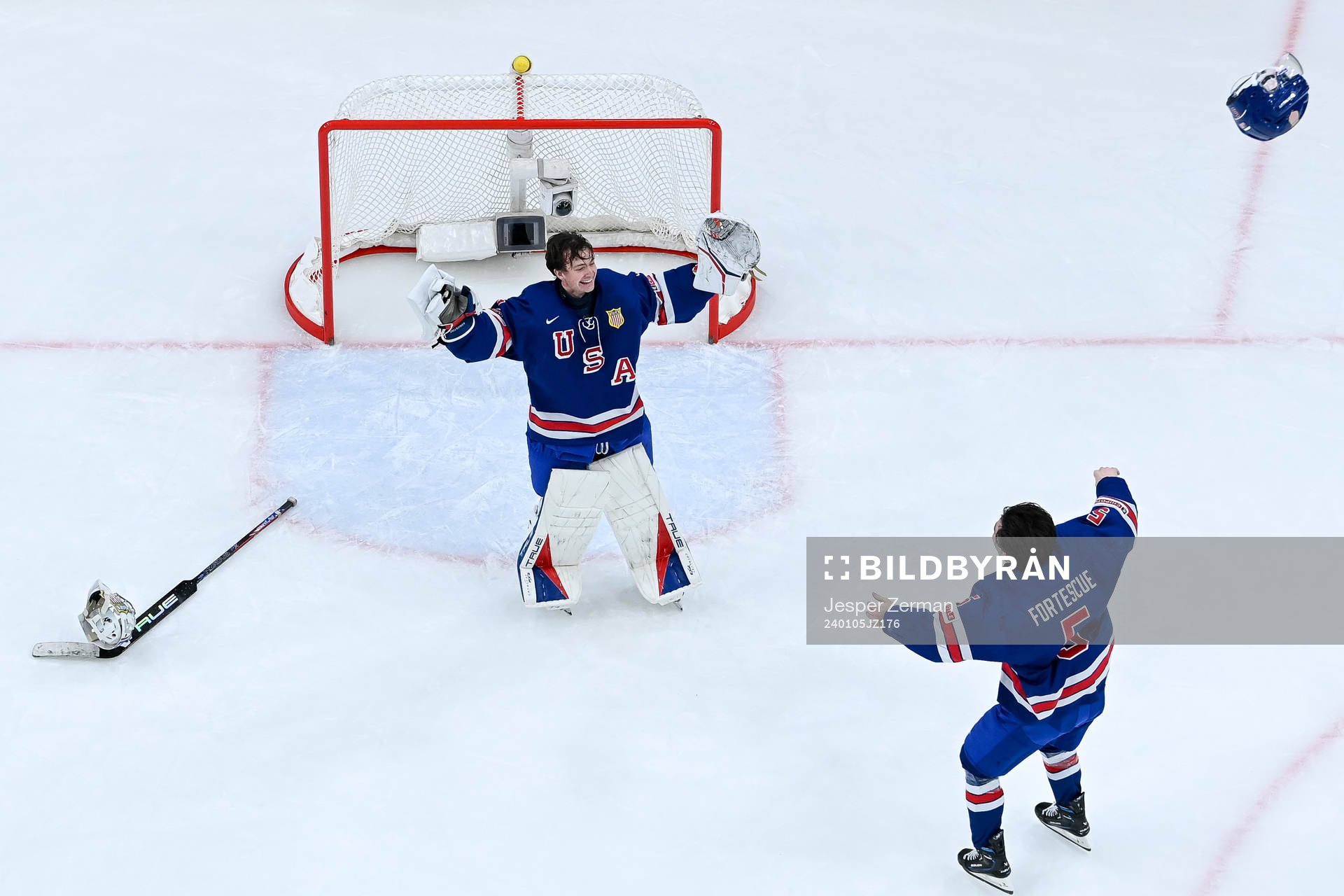 Goaltender Trey Augustine and Drew Fortescue of USA